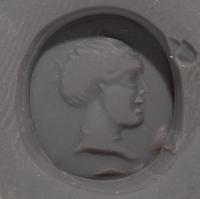 A Roman Carnelian Ring Stone with a Female Portrait Head