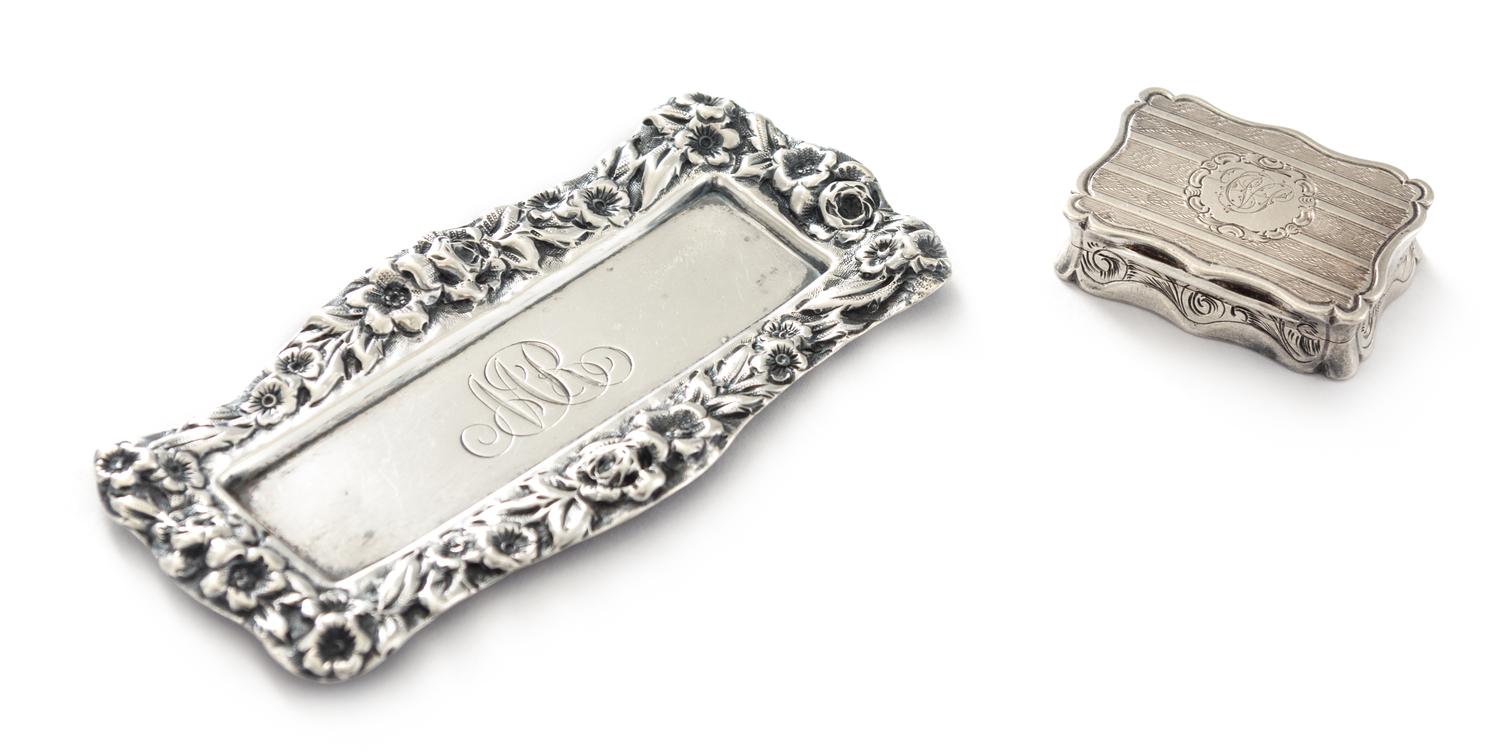 A Victorian Silver Vinaigrette, Robert Thornton, Birmingham, 1870, having a shaped rectangular case, the lid centered by an envgaved mo
