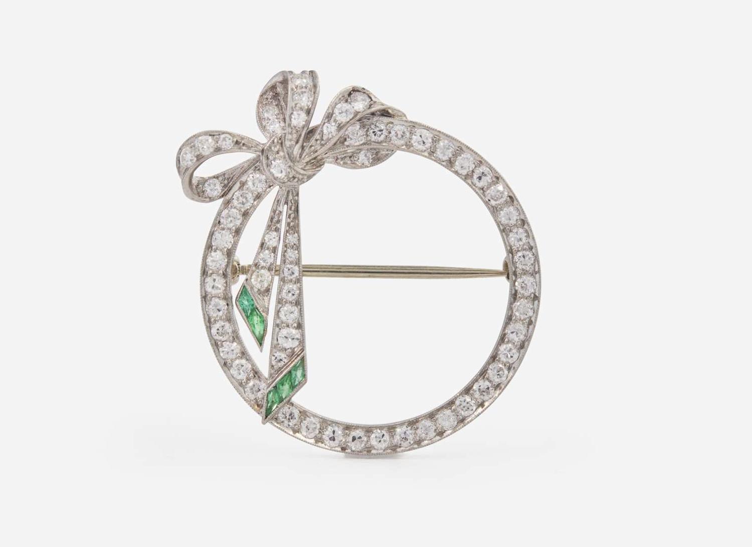 A Platinum and Diamond Circle Pin