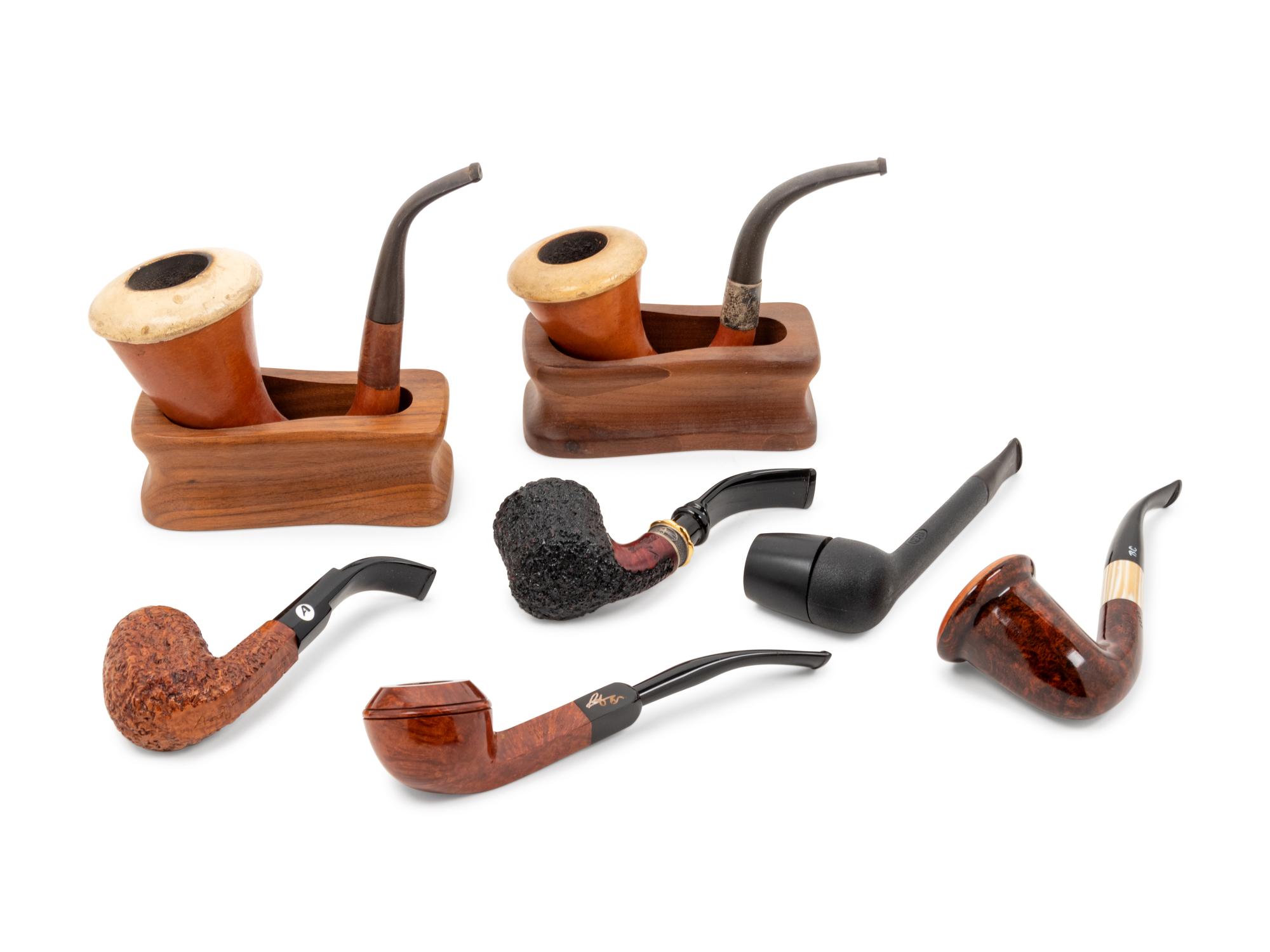 A Collection of Seven Smoking Pipes