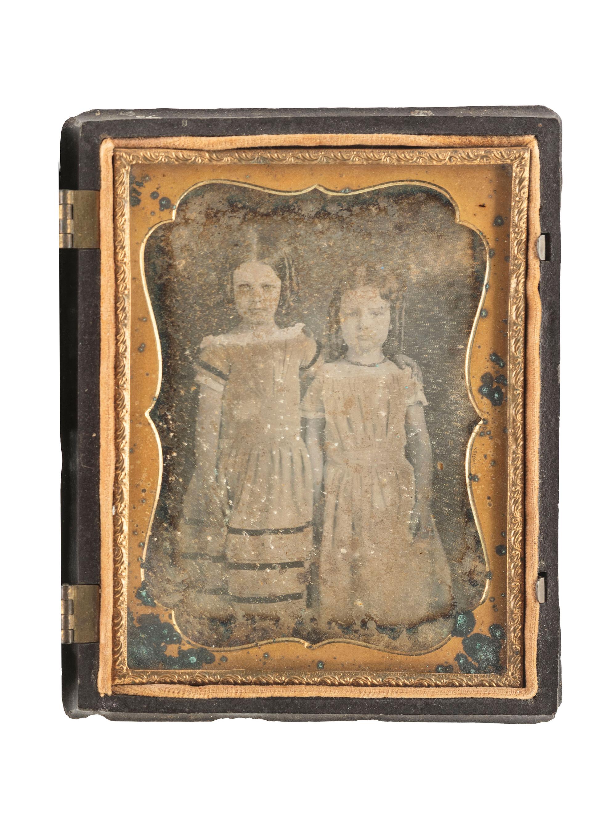 [EARLY PHOTOGRAPHY]. A group of 7 quarter plate Union cases with figural designs, comprising: