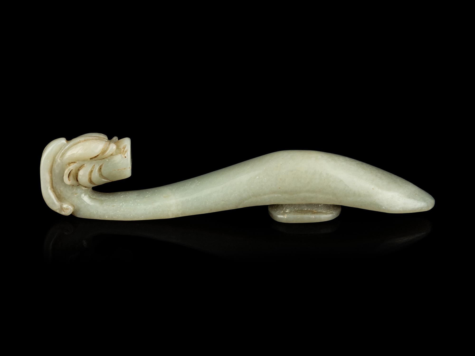 Four Chinese Celadon Jade 'Chilong' Belt Hooks