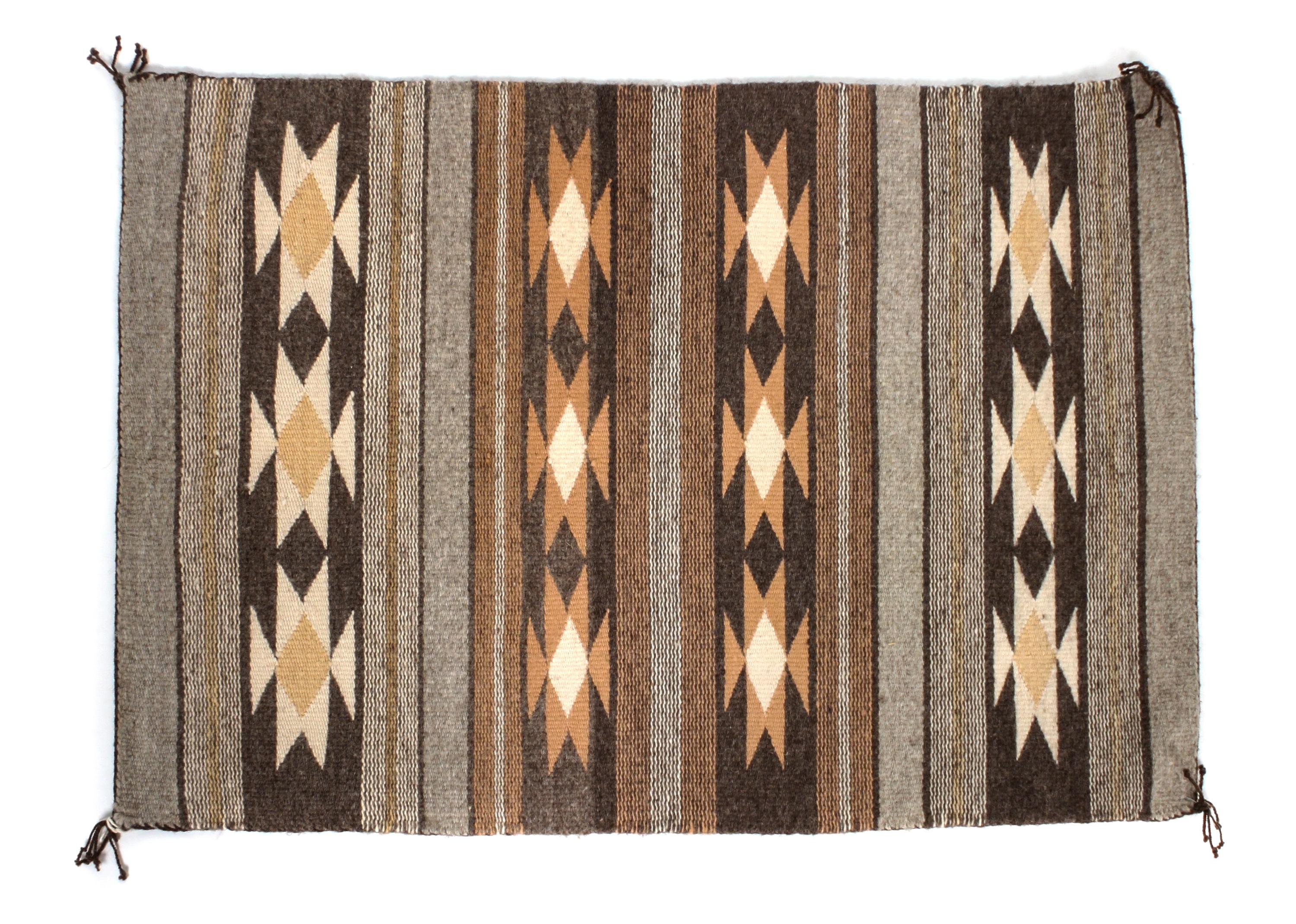 Two Crystal Rugs First: 20 x 30 inches.