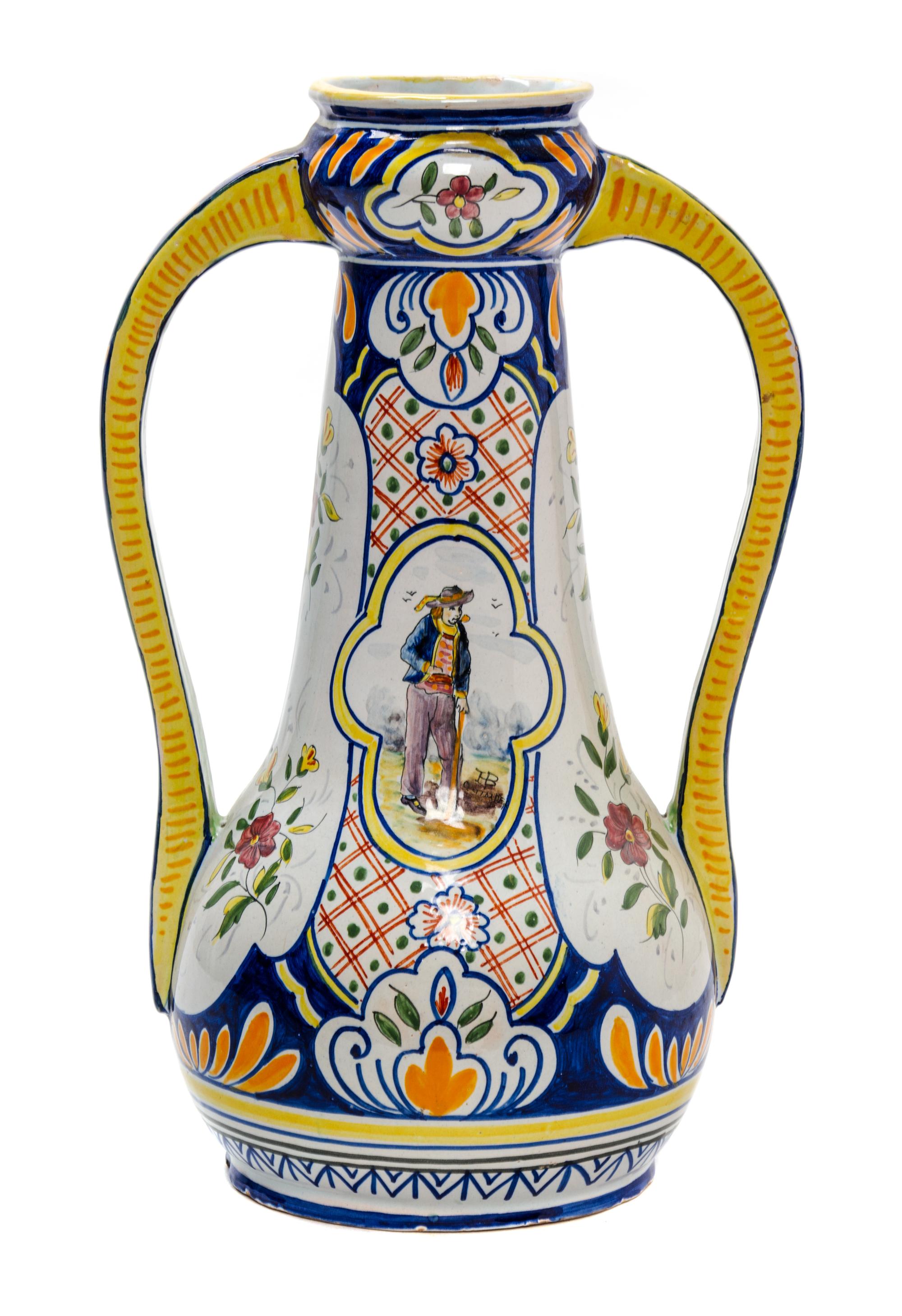 A Quimper Pottery Handled Vase Height 12 inches.