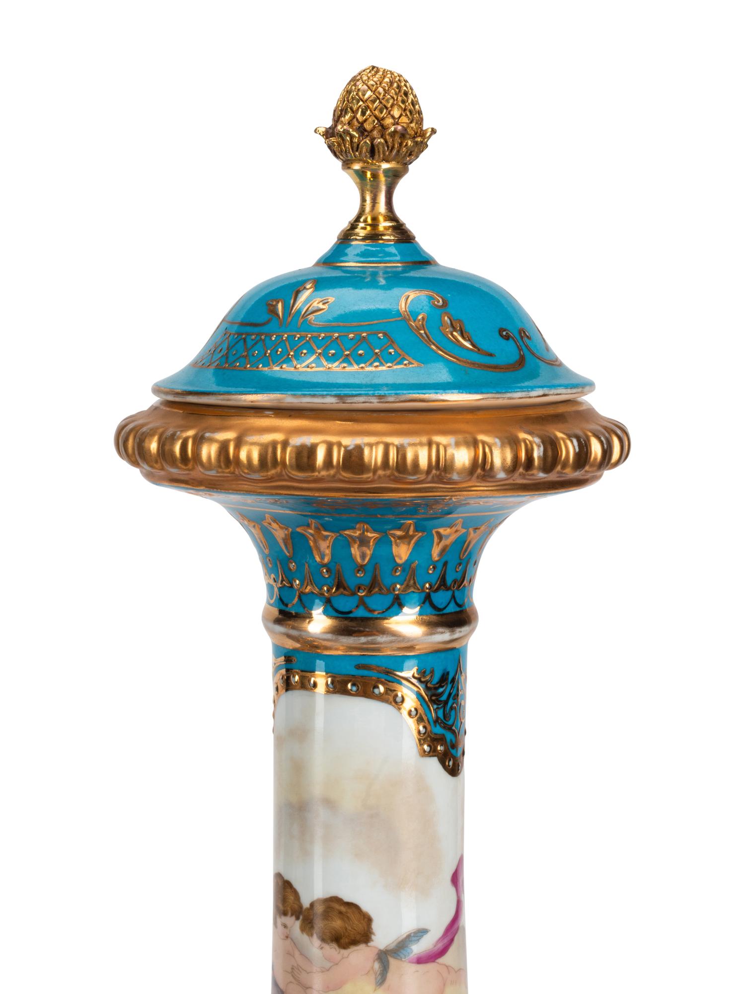 A Pair of Gilt Bronze Mounted Sèvres Style Porcelain Vases and Covers