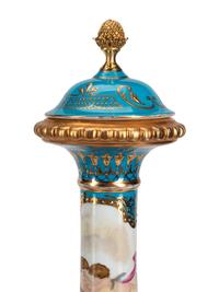 A Pair of Gilt Bronze Mounted Sèvres Style Porcelain Vases and Covers