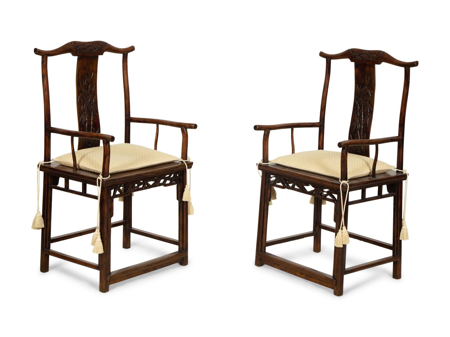 A Pair of Chinese Hardwood Ming Style Yok Back Armchairs