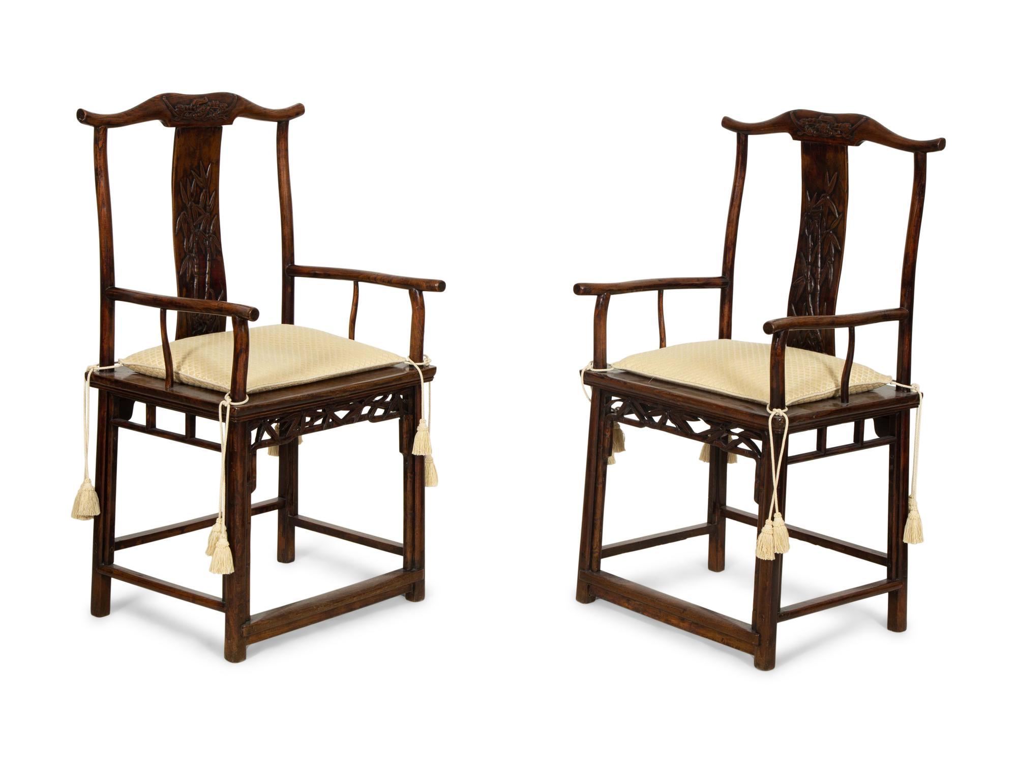 A Pair of Chinese Hardwood Ming Style Yok Back Armchairs