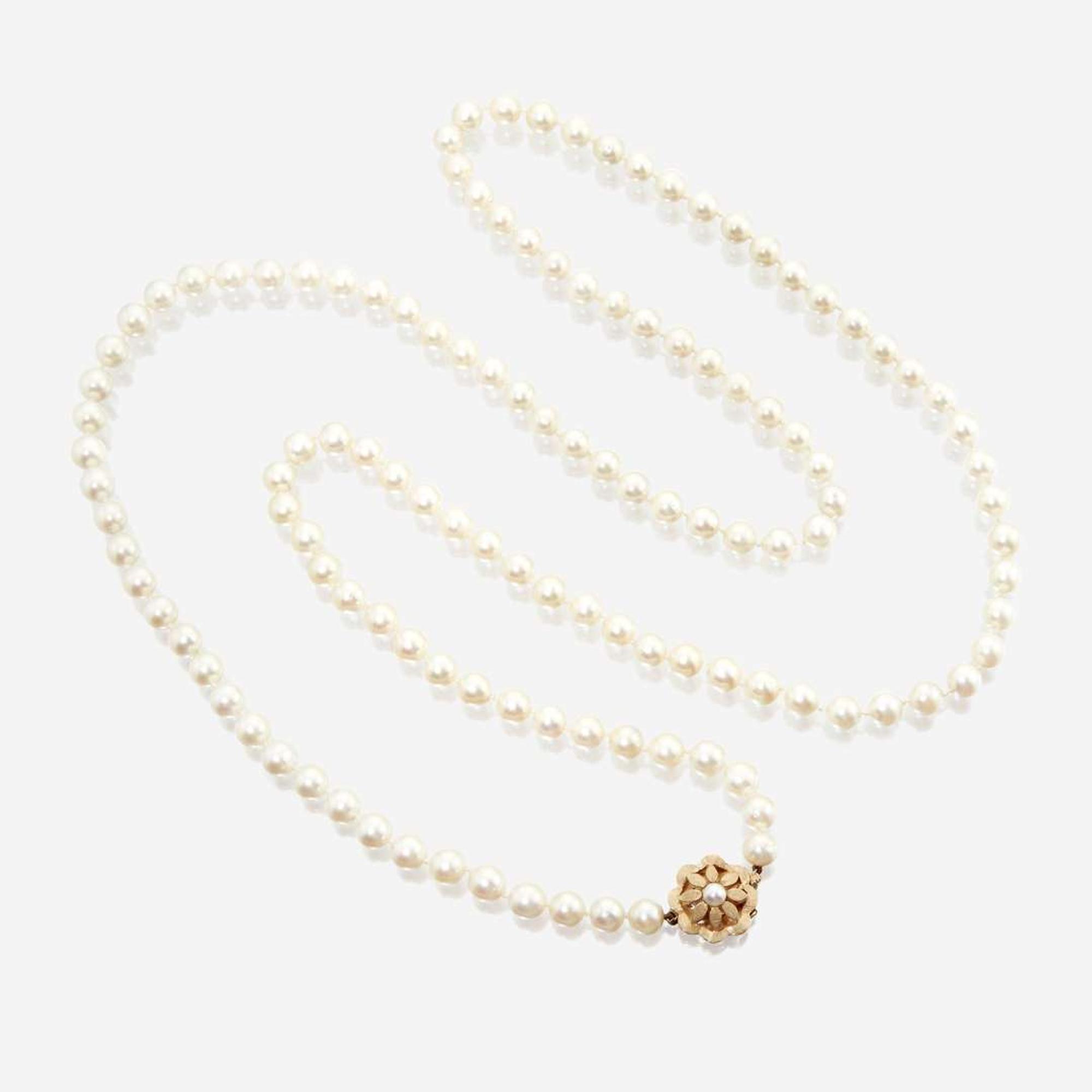 A collection of two cultured pearl necklaces and one bracelet