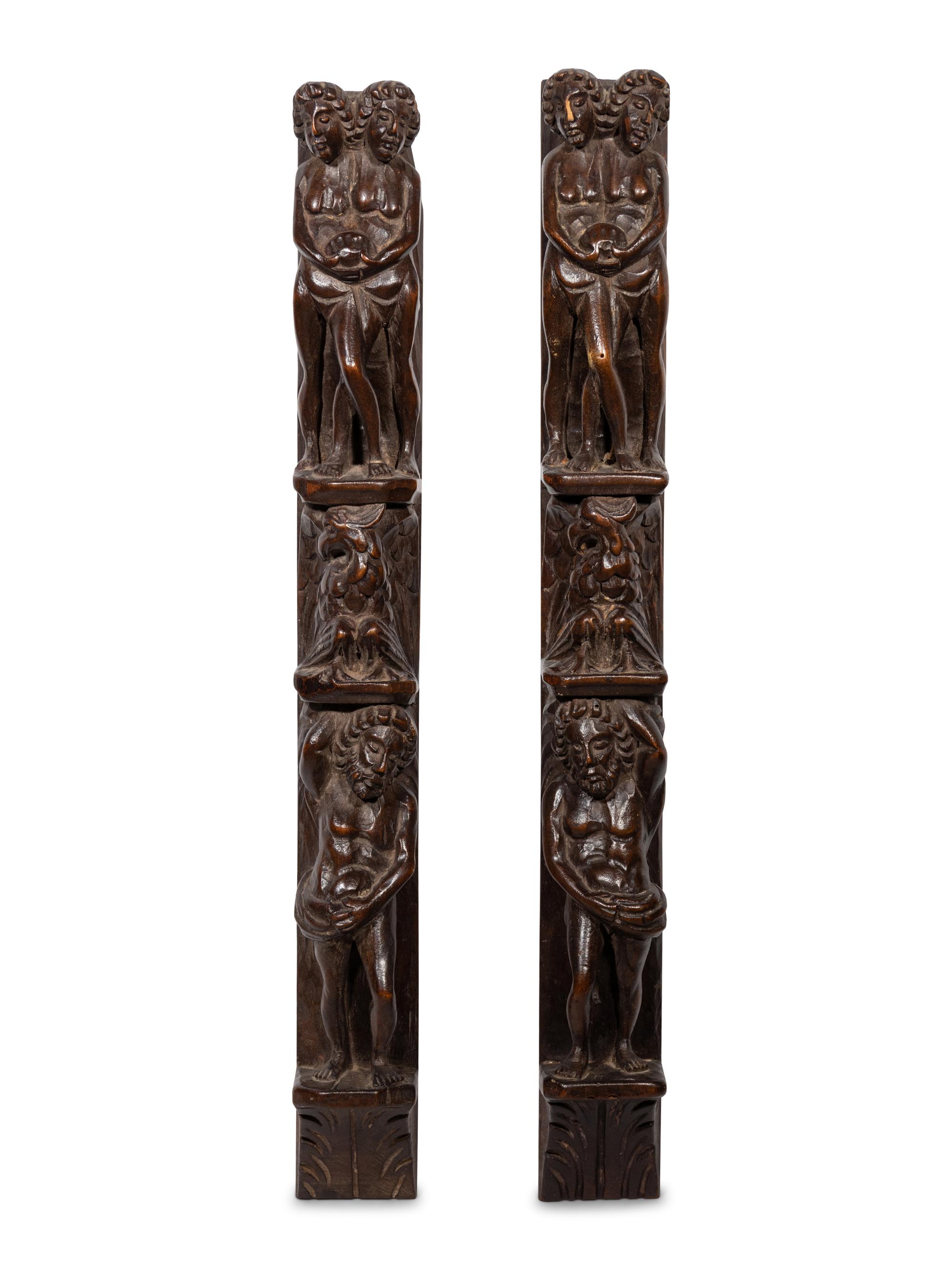 A Pair of Continental Carved Figural Pilasters