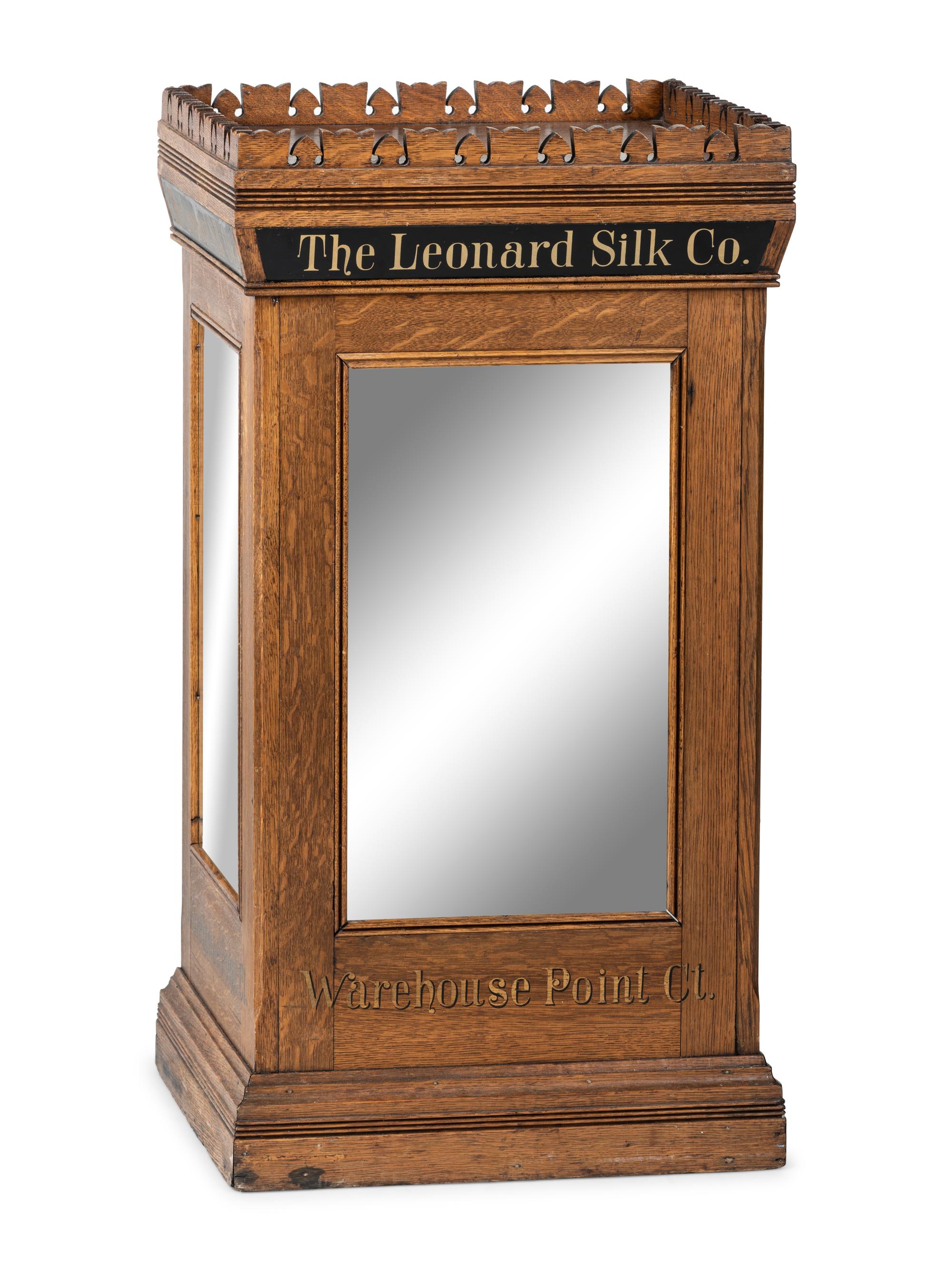 A Leonard Silk Co. Oak Floor Spool Cabinet