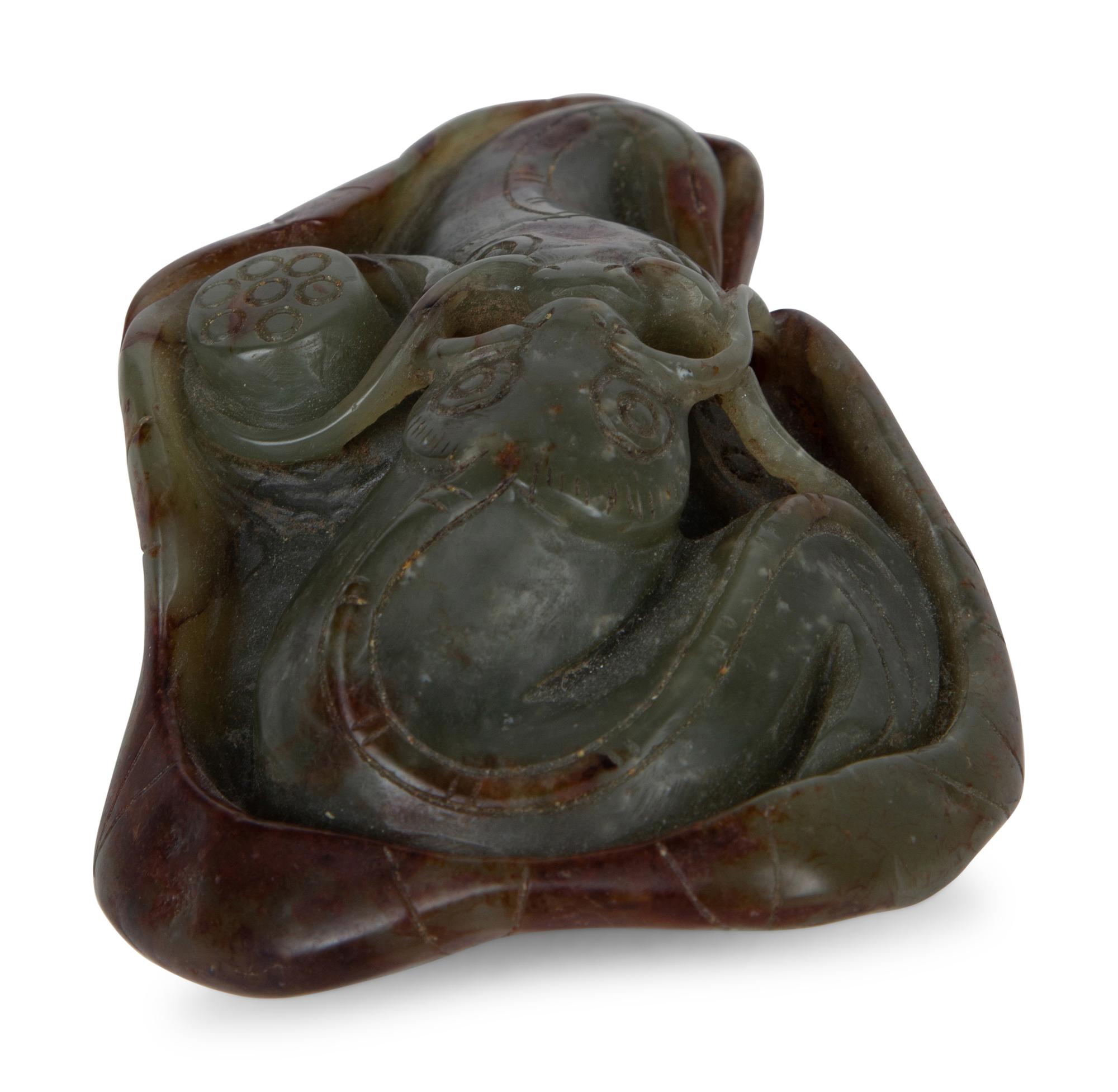 A Chinese Carved Jade Double Carp on Lily Pad — 20TH CENTURY
