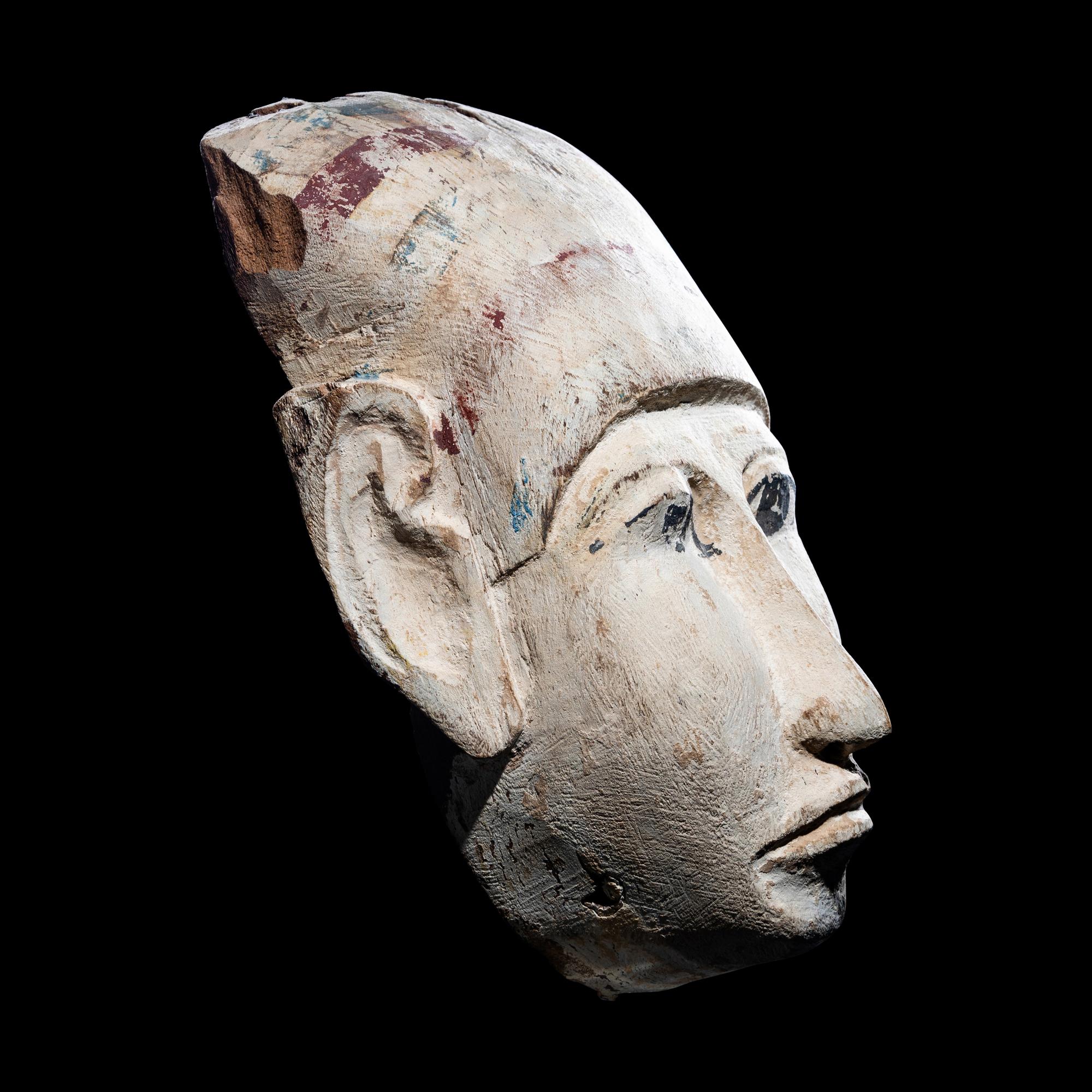 An Egyptian Wood Mummy Mask