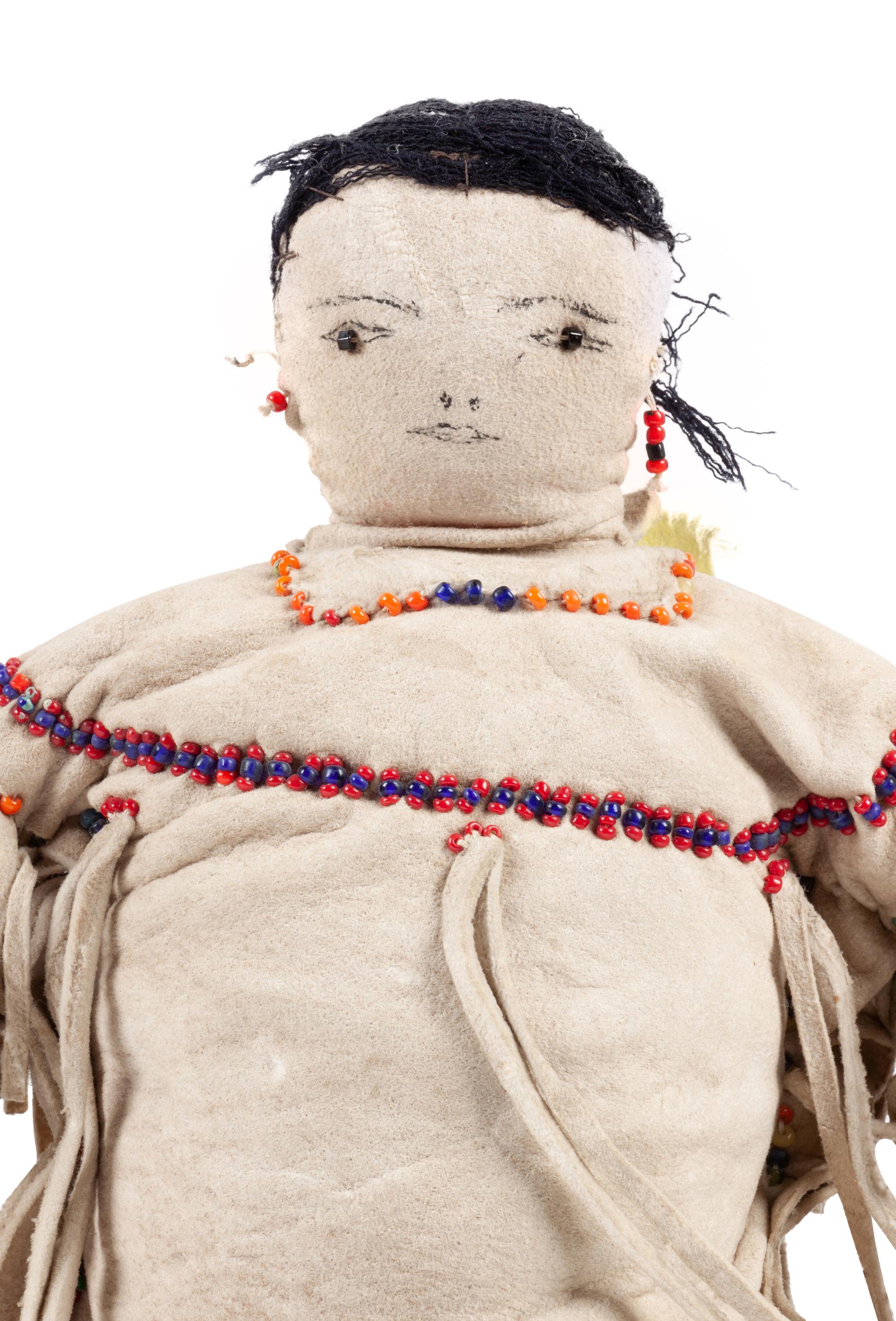 Apache and Plains Beaded Hide Dolls