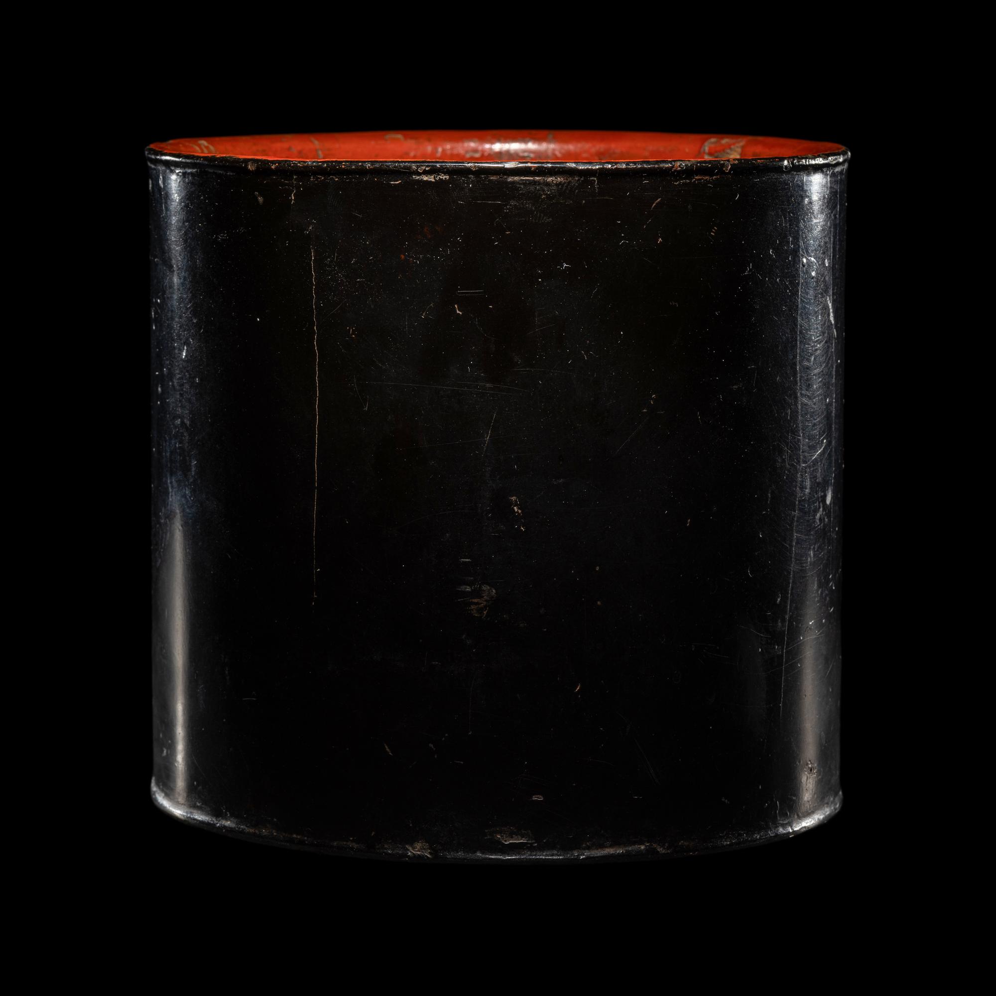 A Chinese Black and Red Lacquered Brushpot, Bitong, Wanli Mark 萬曆丙午（1606）款黑漆素面筆筒