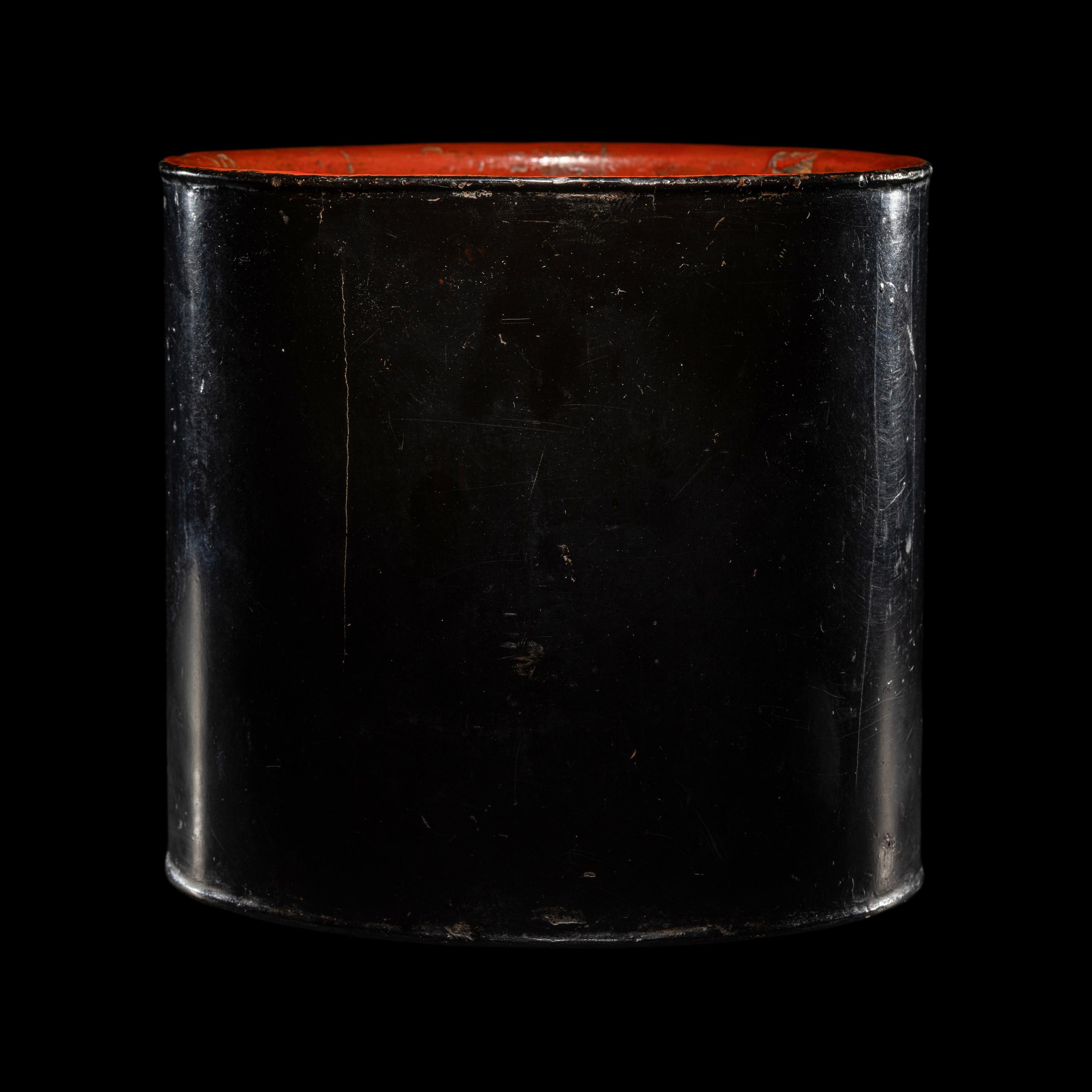 A Chinese Black and Red Lacquered Brushpot, Bitong, Wanli Mark 萬曆丙午（1606）款黑漆素面筆筒