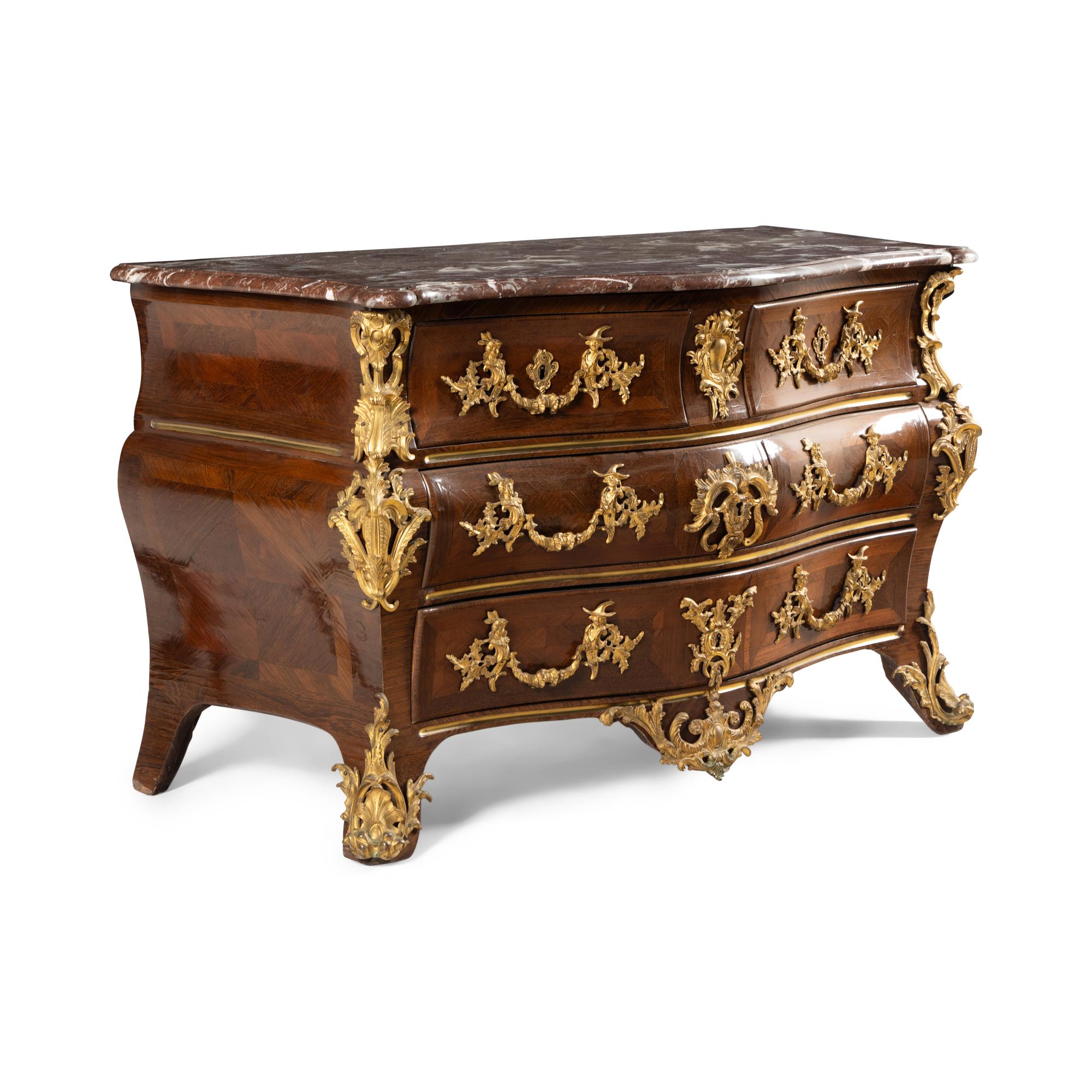 A Louis XV Kingwood Parquetry and Gilt Bronze Mounted Marble-Top Commode
