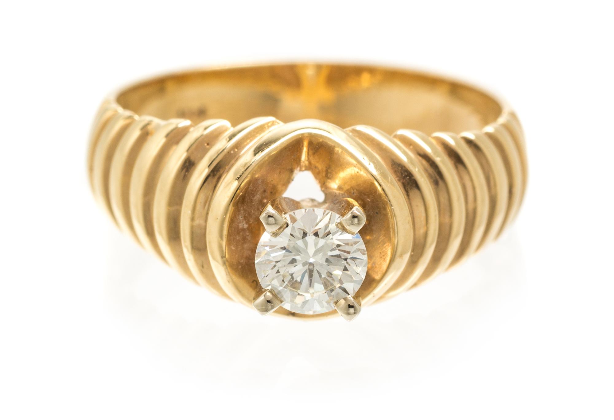 A 14 Karat Yellow Gold and Diamond Ring, 2.50 dwts.