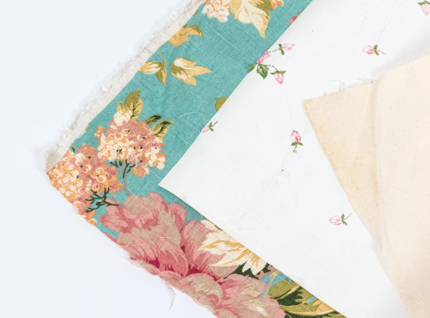 Three Rolls of Fabric Width of widest 55 inches.