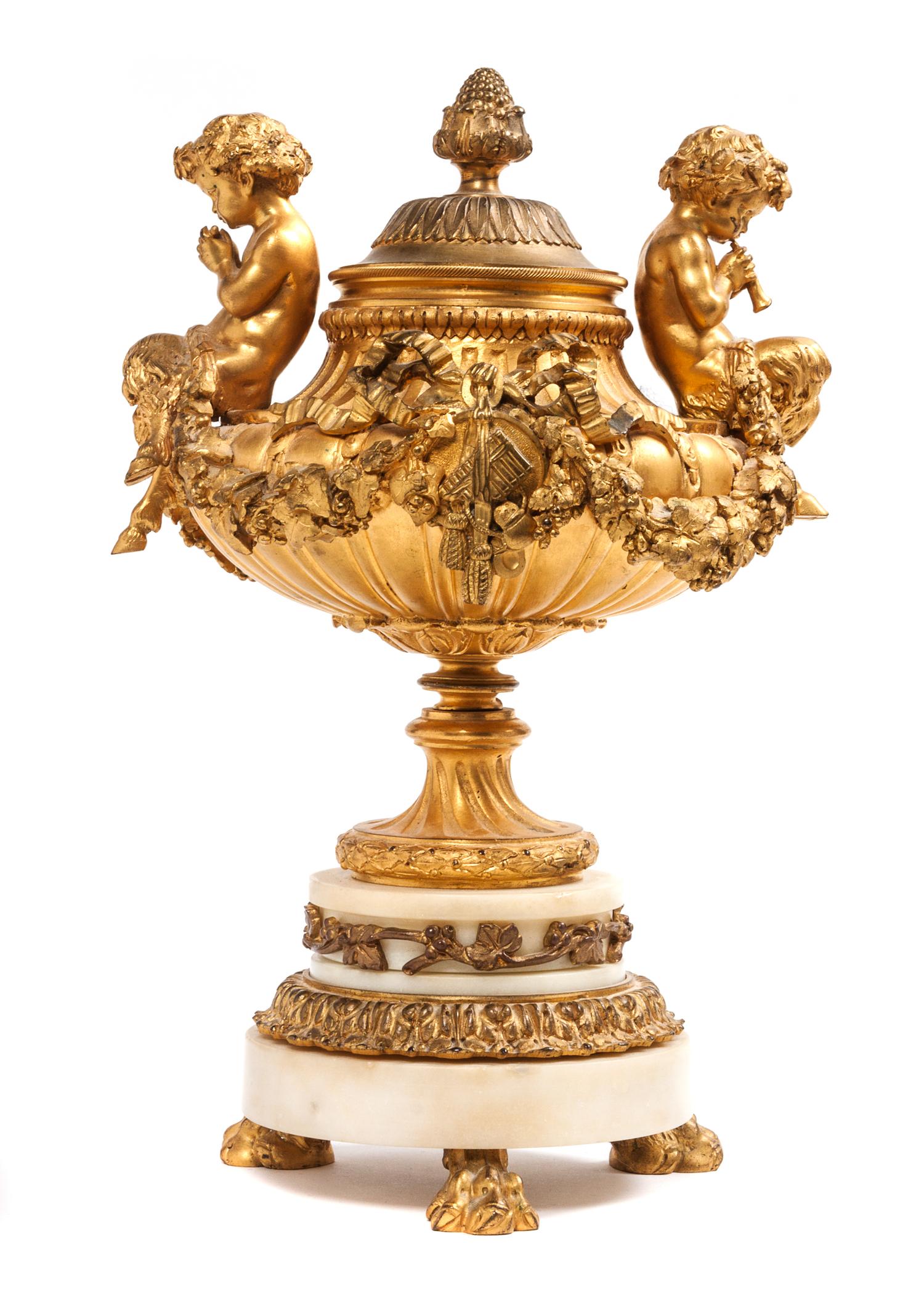 A French Gilt Bronze Diminutive Lidded Urn Height 12 inches.