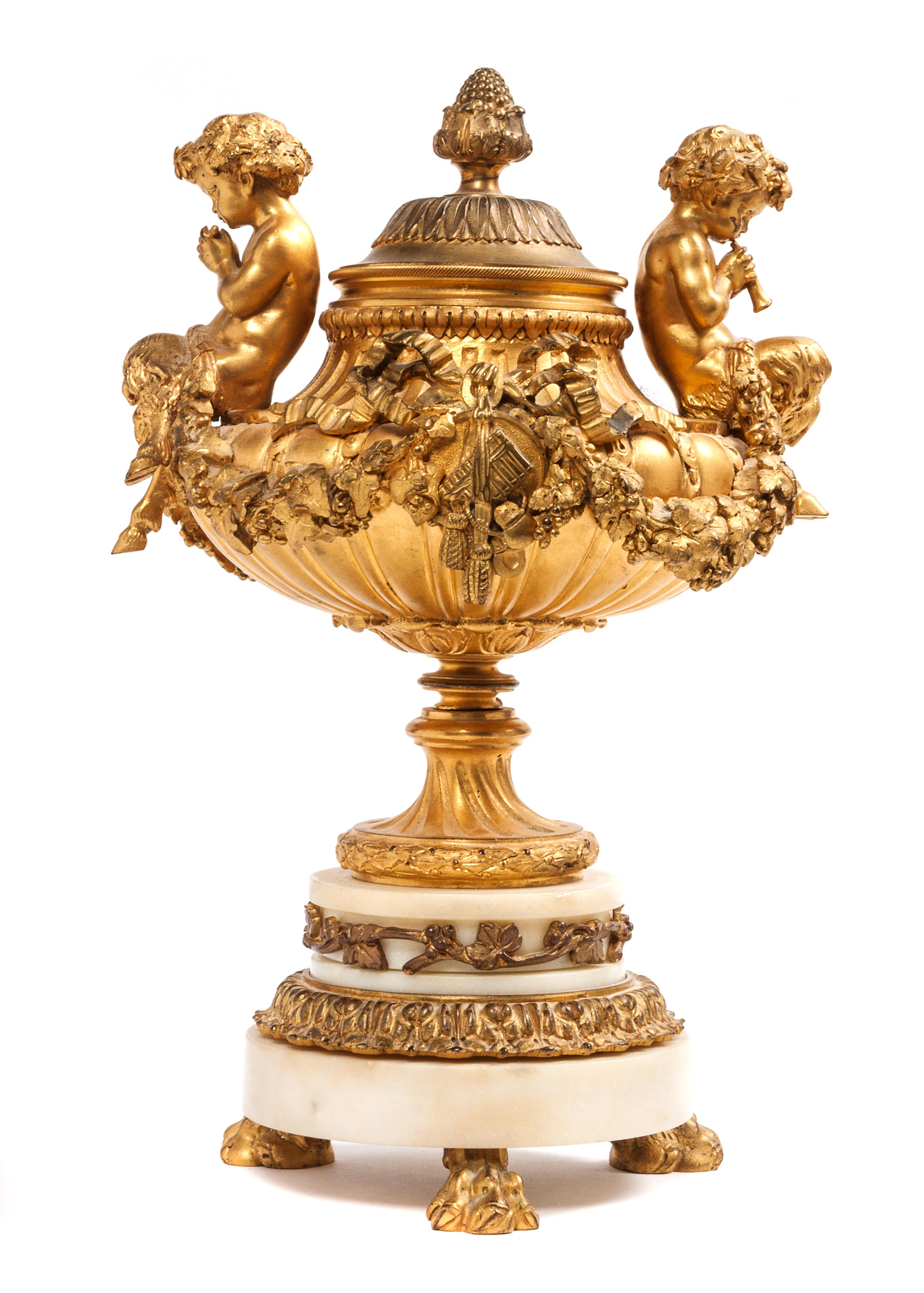 A French Gilt Bronze Diminutive Lidded Urn Height 12 inches.