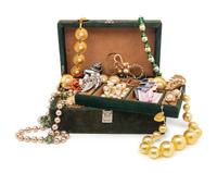 GREEN SUEDE JEWELRY BOX WITH A COLLECTION OF COSTUME JEWELRY