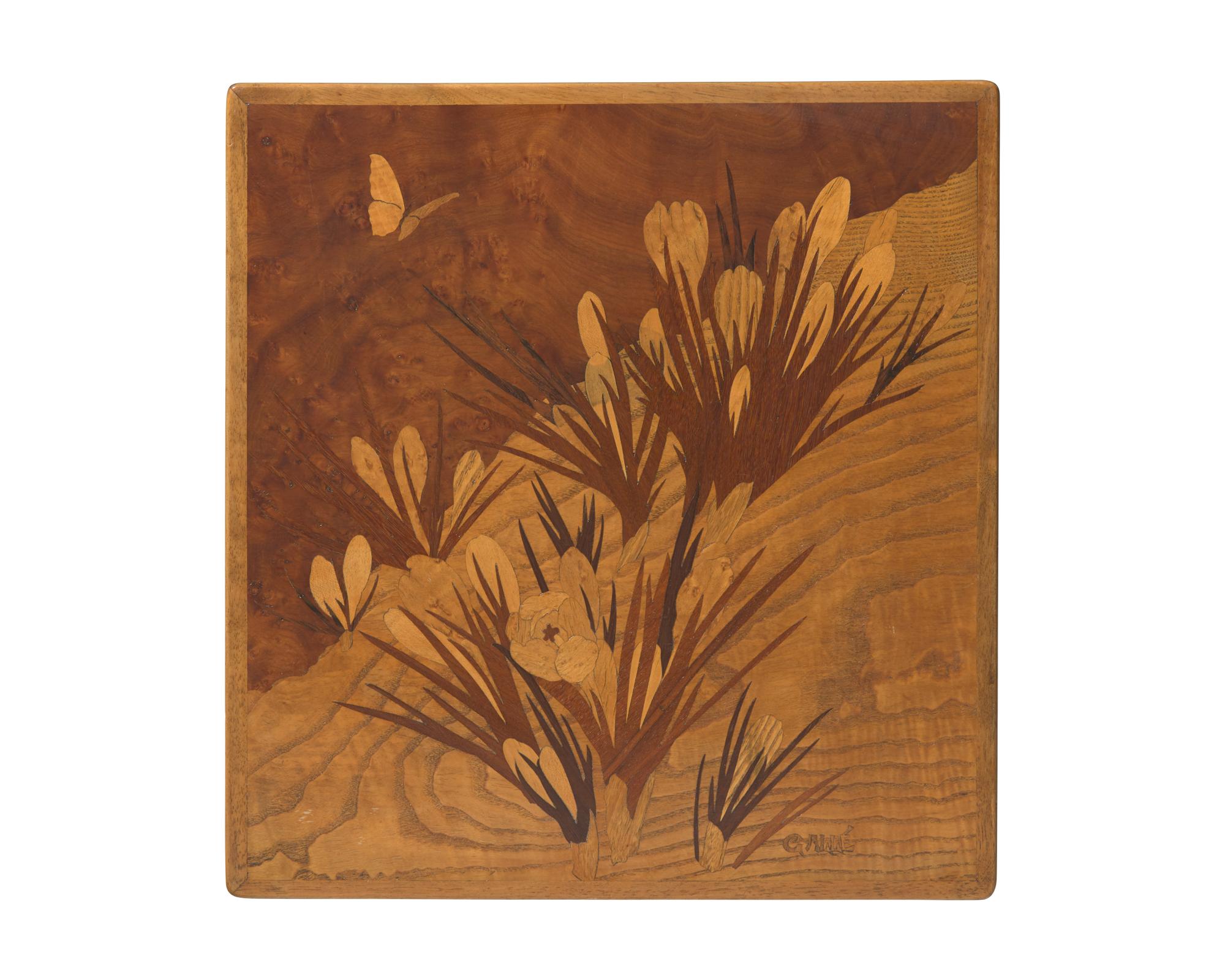 Émile Gallé (French, 1846-1904), A group of four Art Nouveau carved mahogany and marquetry nesting tables, circa 1900