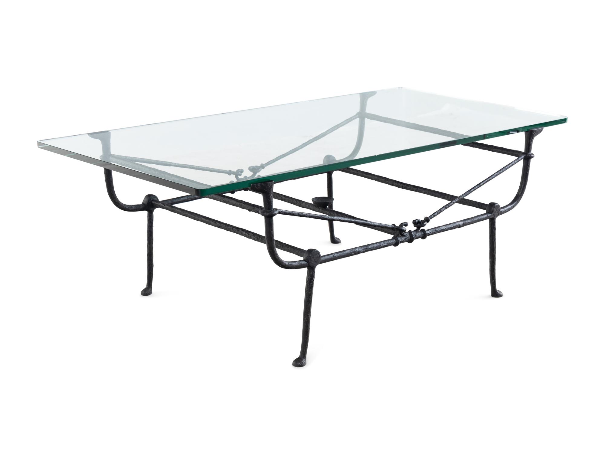 A Cast Iron and Glass Low Table in the Style of Giacometti