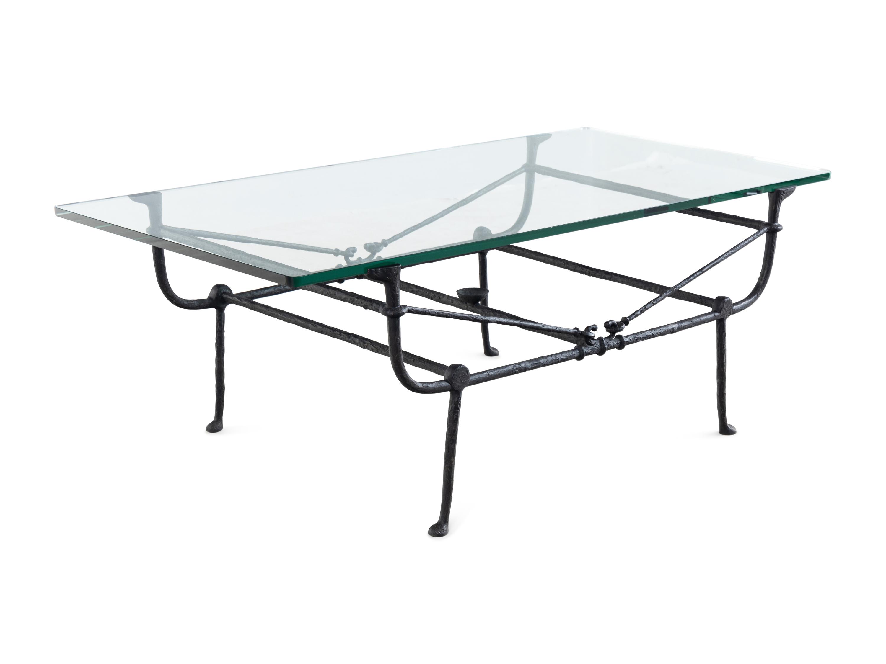 A Cast Iron and Glass Low Table in the Style of Giacometti