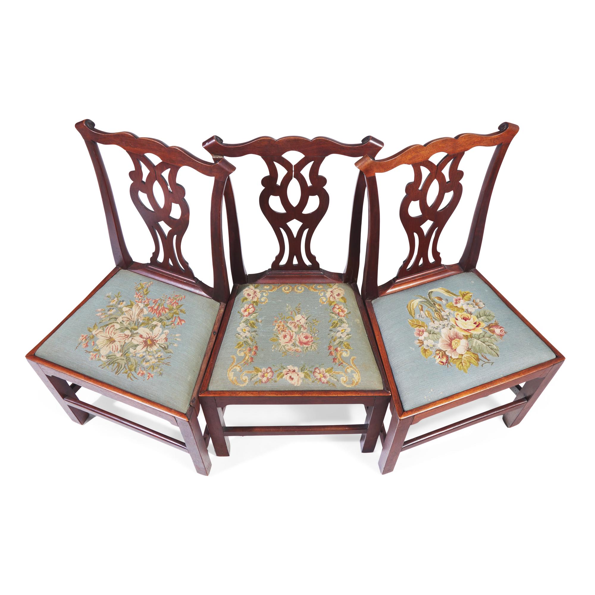 A Group of Three George III Carved Walnut Side Chairs