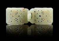 A Chinese Light Celadon Jade Two-Part Buckle 19TH/20TH CENTURY Length overall 4 3/8 inches. — 19TH/20TH CENTURY