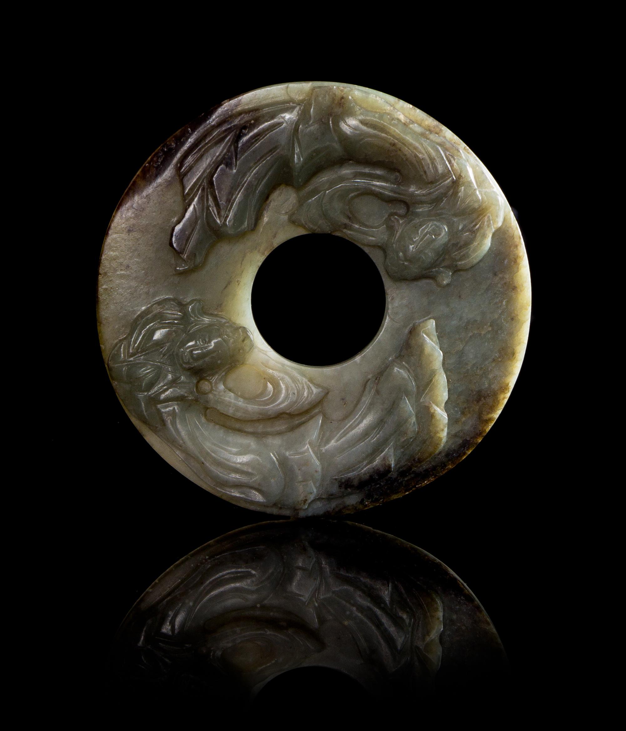 A Celadon Jade Bi Disc Diameter 2 3/4 inches.