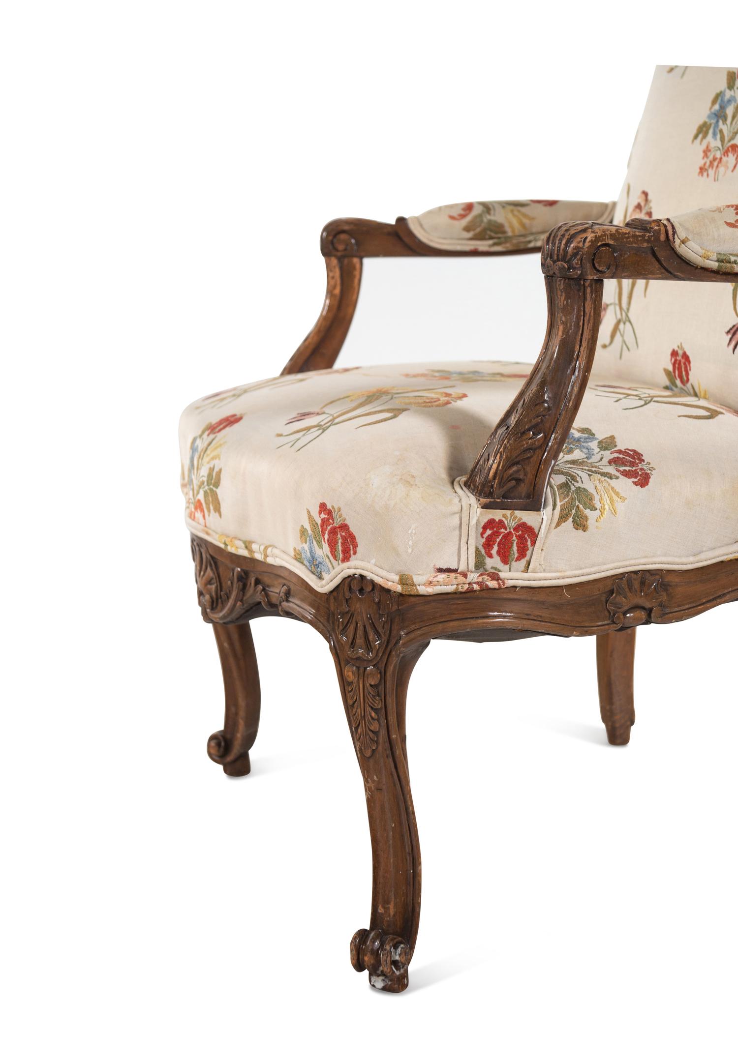 A Régence Style Carved Walnut Armchair