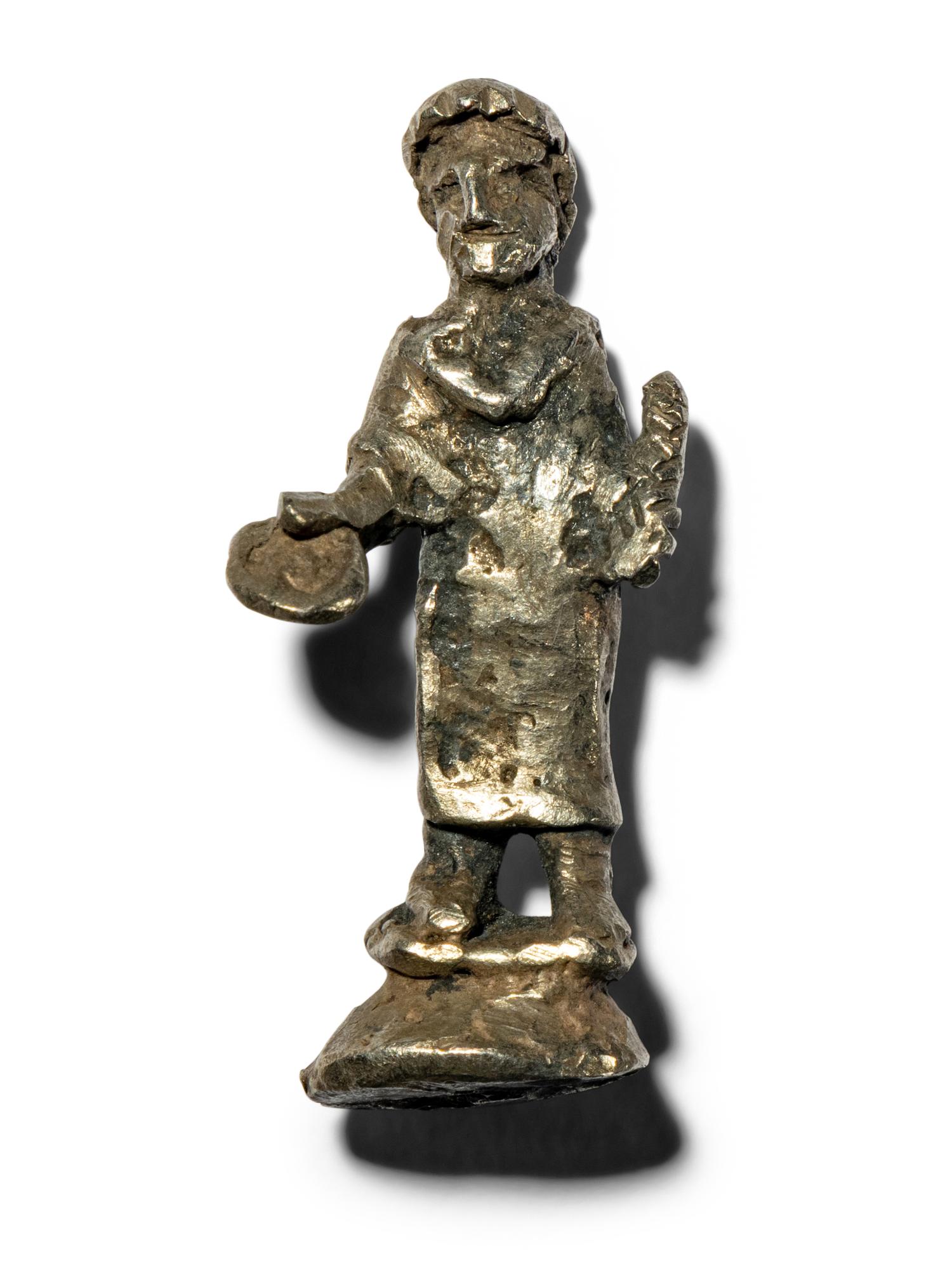 A Roman Silver Votive Figure