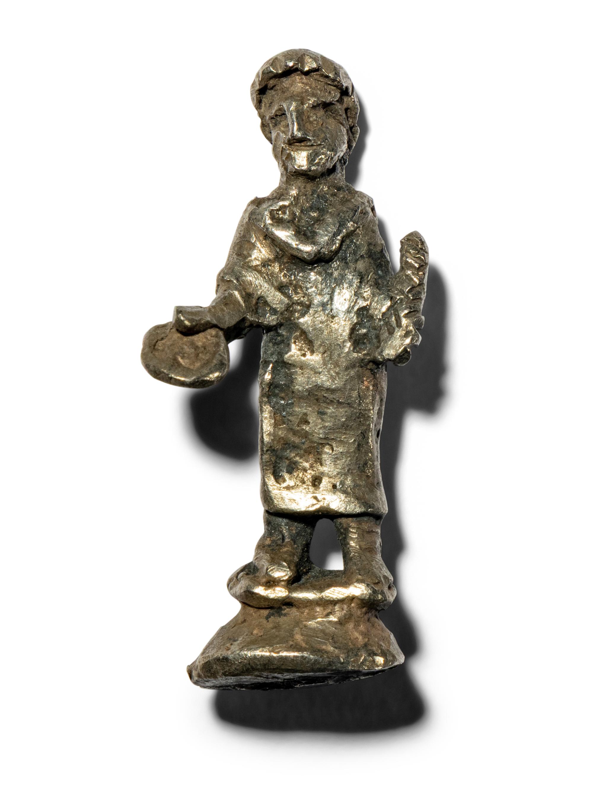 A Roman Silver Votive Figure