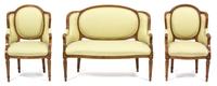A Louis XVI Style Diminutive Carved Walnut Seating Group Height of chairs 27 inches. — 20TH CENTURY