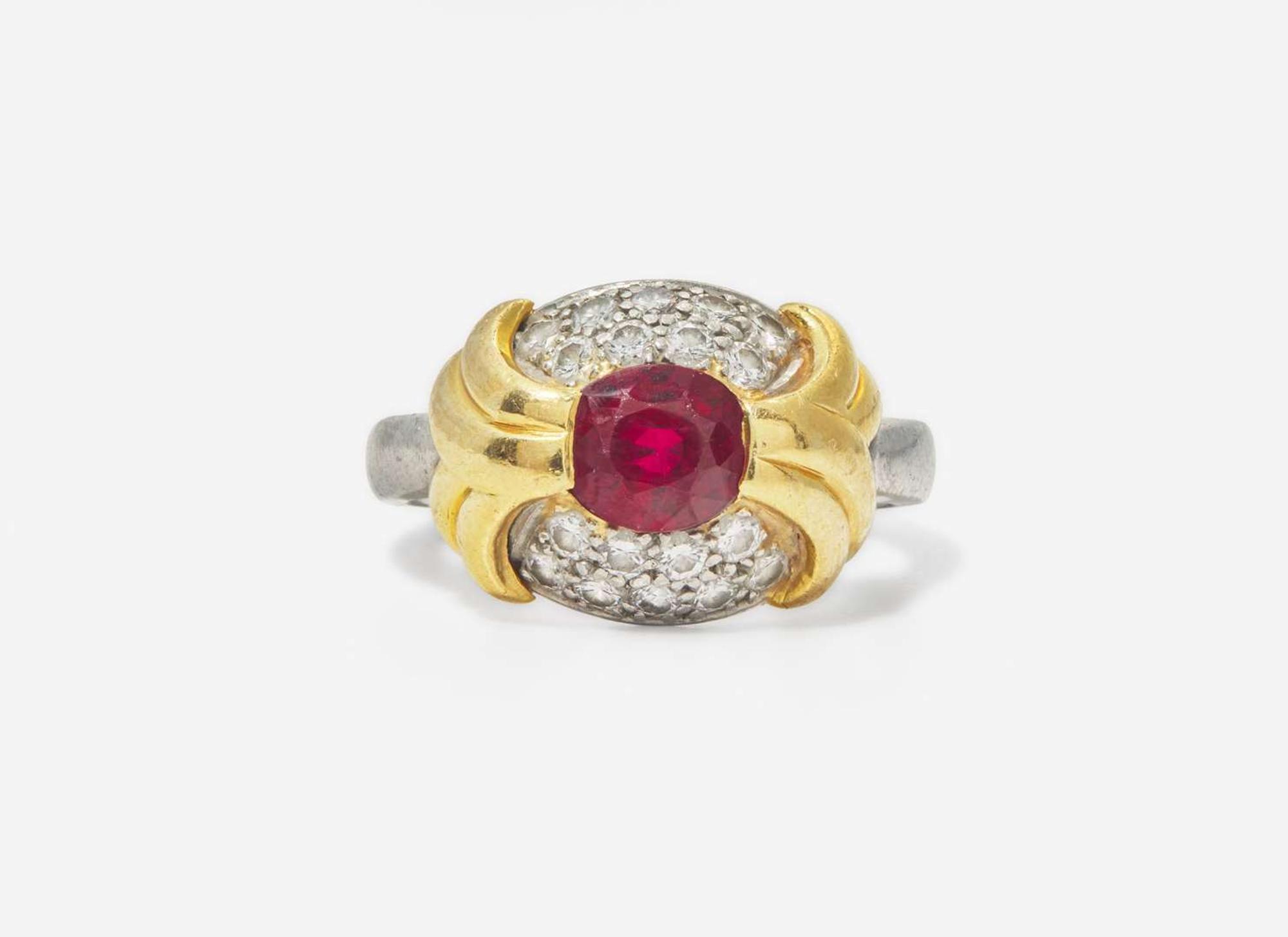 A Ladies Platinum, 18K Yellow Gold, Ruby, and Diamond Ring