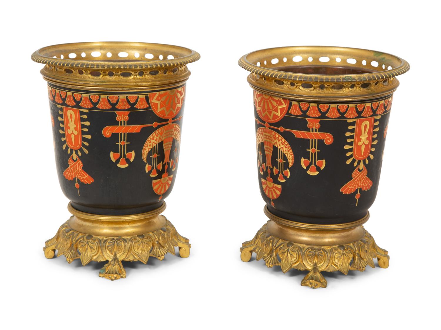 A Pair of French Egyptian Rivival Gilt Bronze Mounted Porcelain Cache Pots