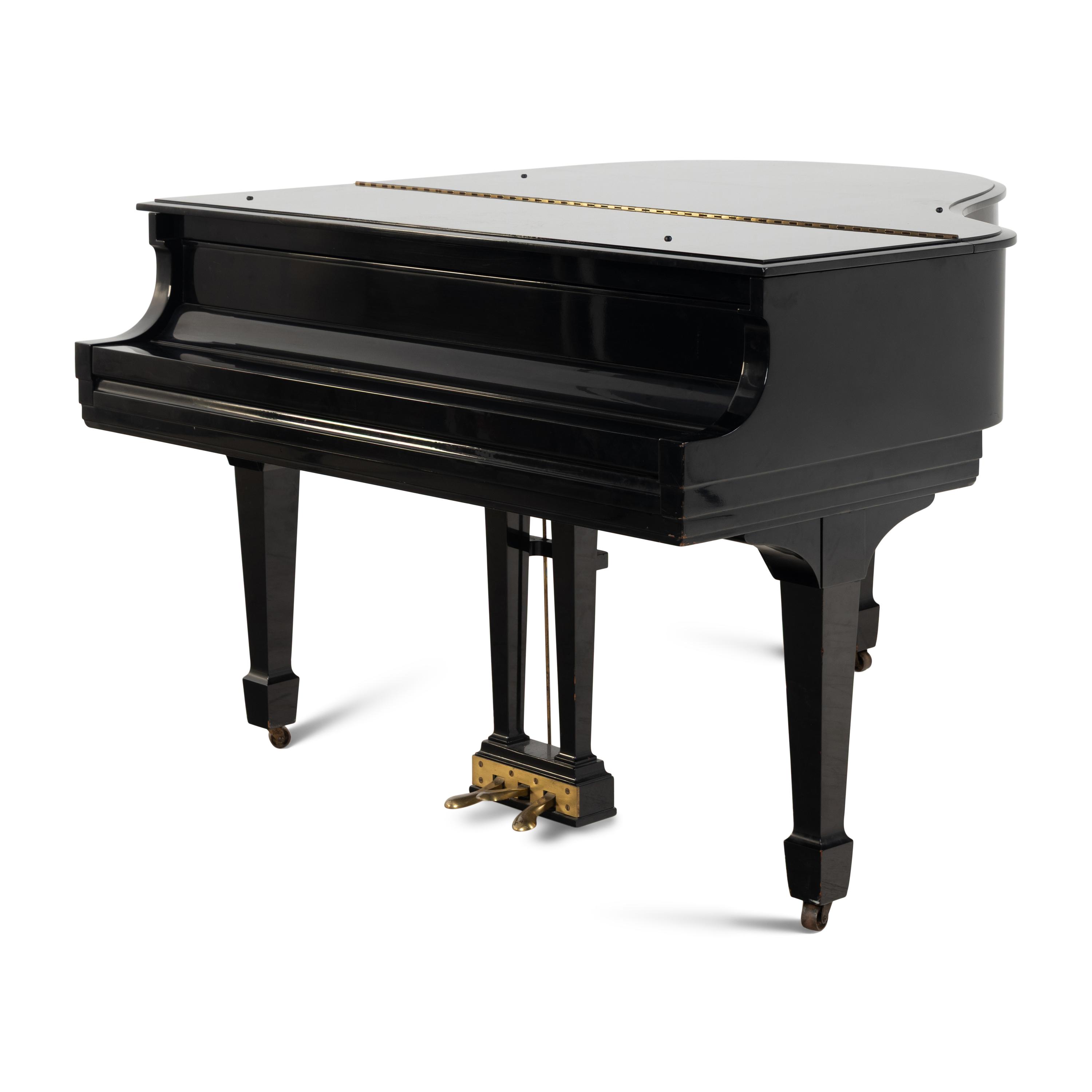 A Steinway and Sons Baby Grand Piano