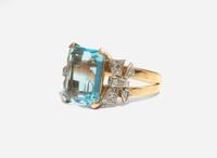 A 14K Yellow Gold and Aquamarine Ring