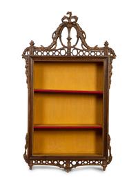 An Italian Louis XVI Style Walnut and Parcel Gilt Hanging Vitrine — 20TH CENTURY