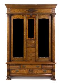 A Victorian Oak Armoire, Height 102 x width 63 x depth 24 inches.
