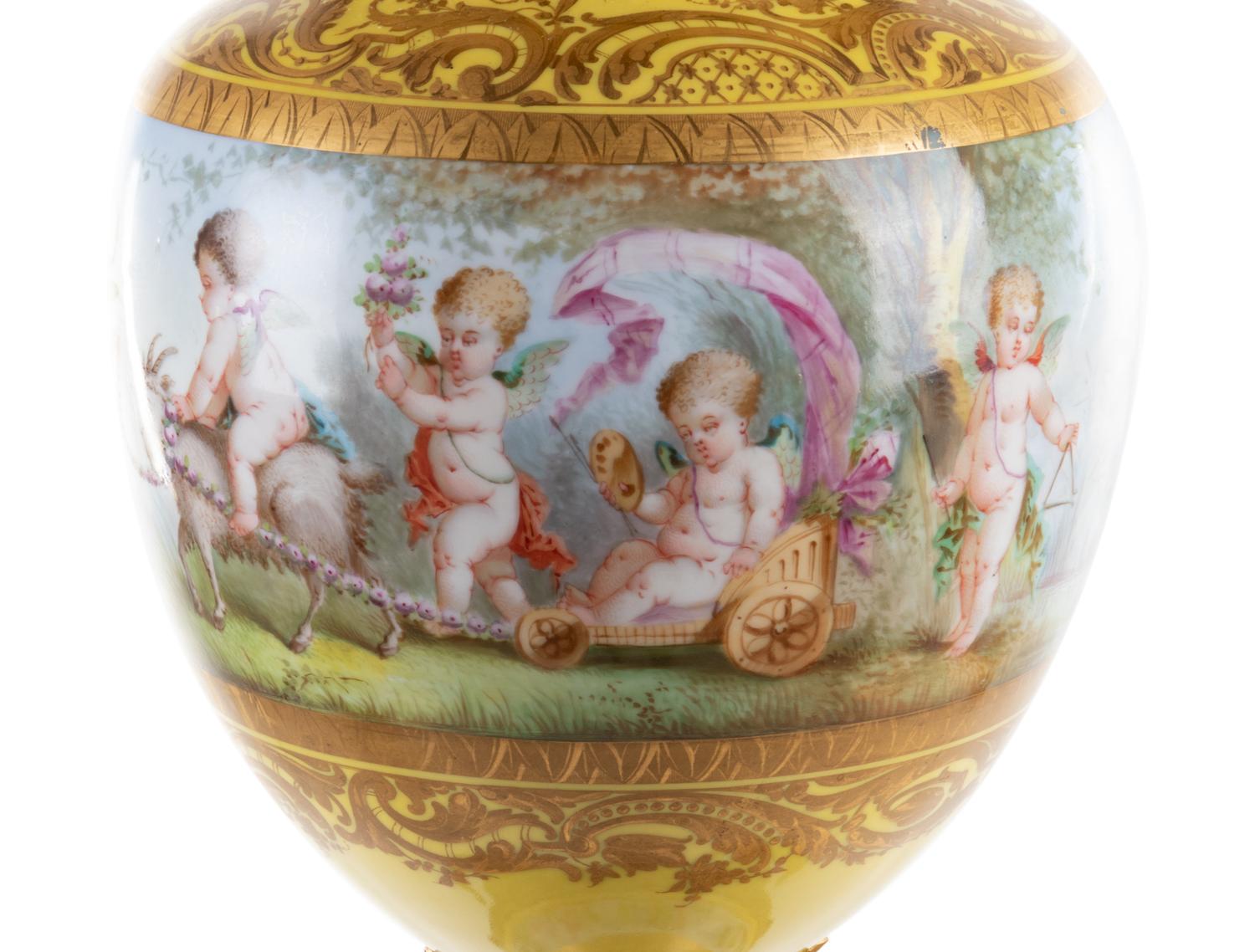 A Sèvres Style Gilt Bronze Mounted Painted and Parcel Gilt Porcelain Banquet Lamp