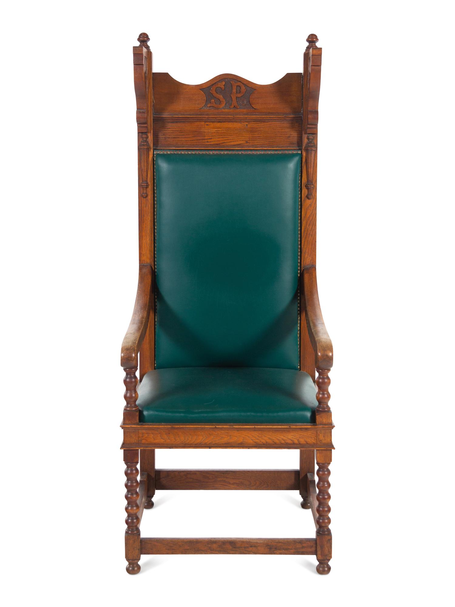 A Jacobean Style Carved Oak Armchair