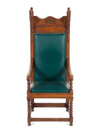 A Jacobean Style Carved Oak Armchair