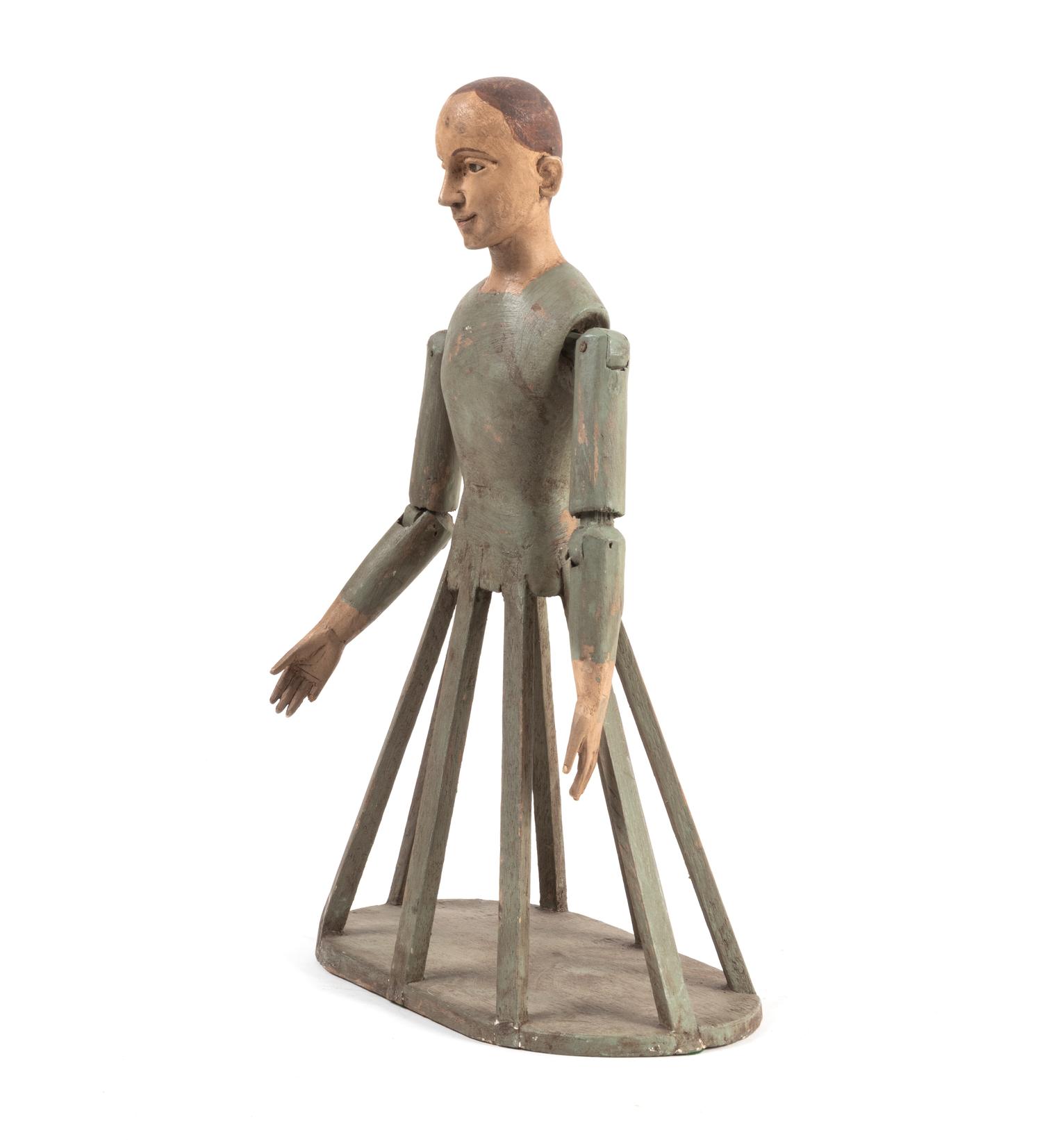 A Continental Painted Cage Doll