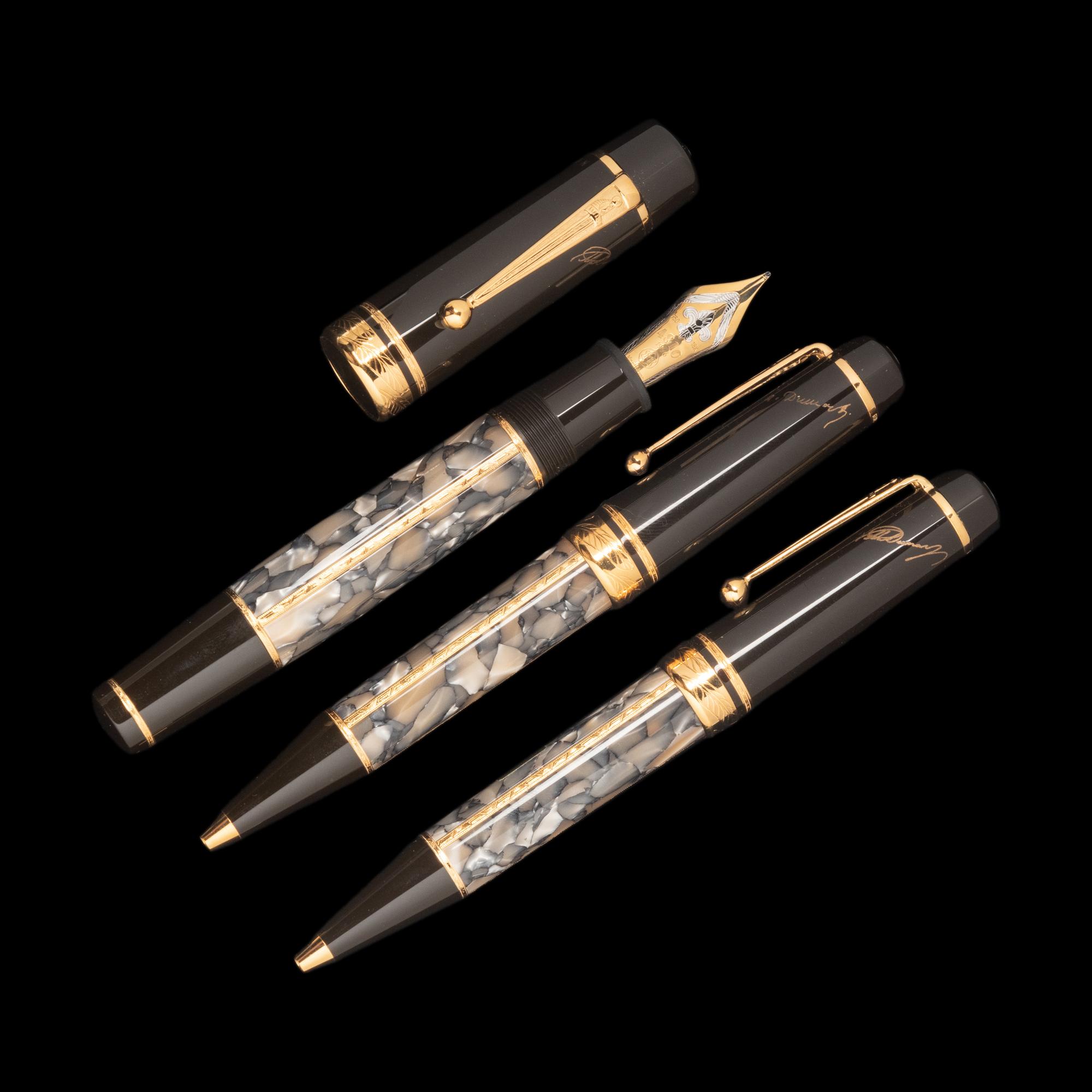 A Montblanc Limited Edition Alexandre Dumas Fountain Pen and Two Rollerball Pen Set