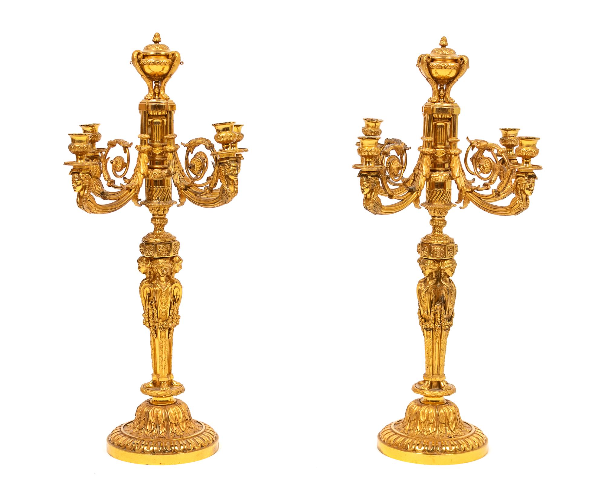 A Pair of Louis XVI Style Gilt-Bronze Four-Light Candelabra