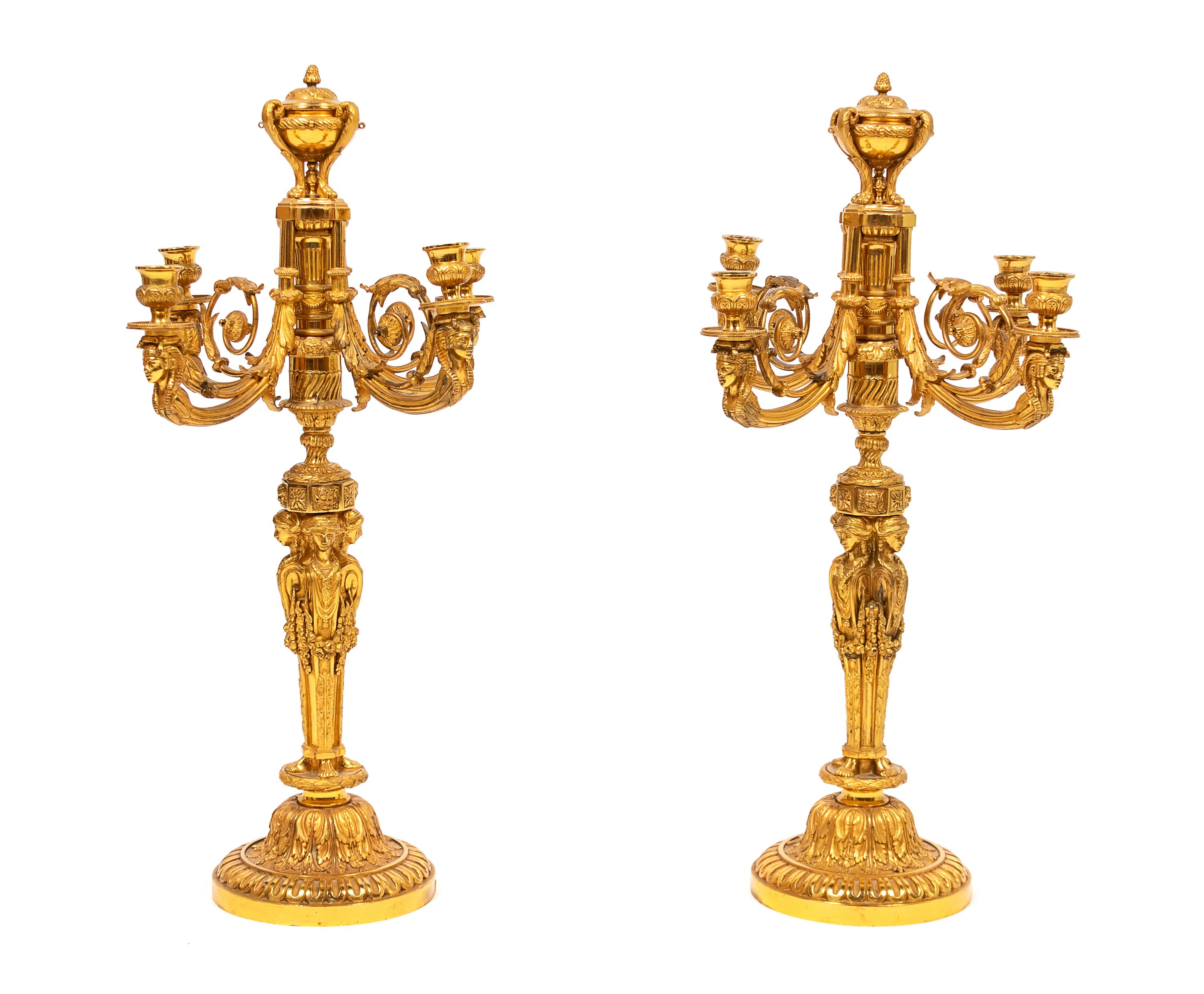A Pair of Louis XVI Style Gilt-Bronze Four-Light Candelabra