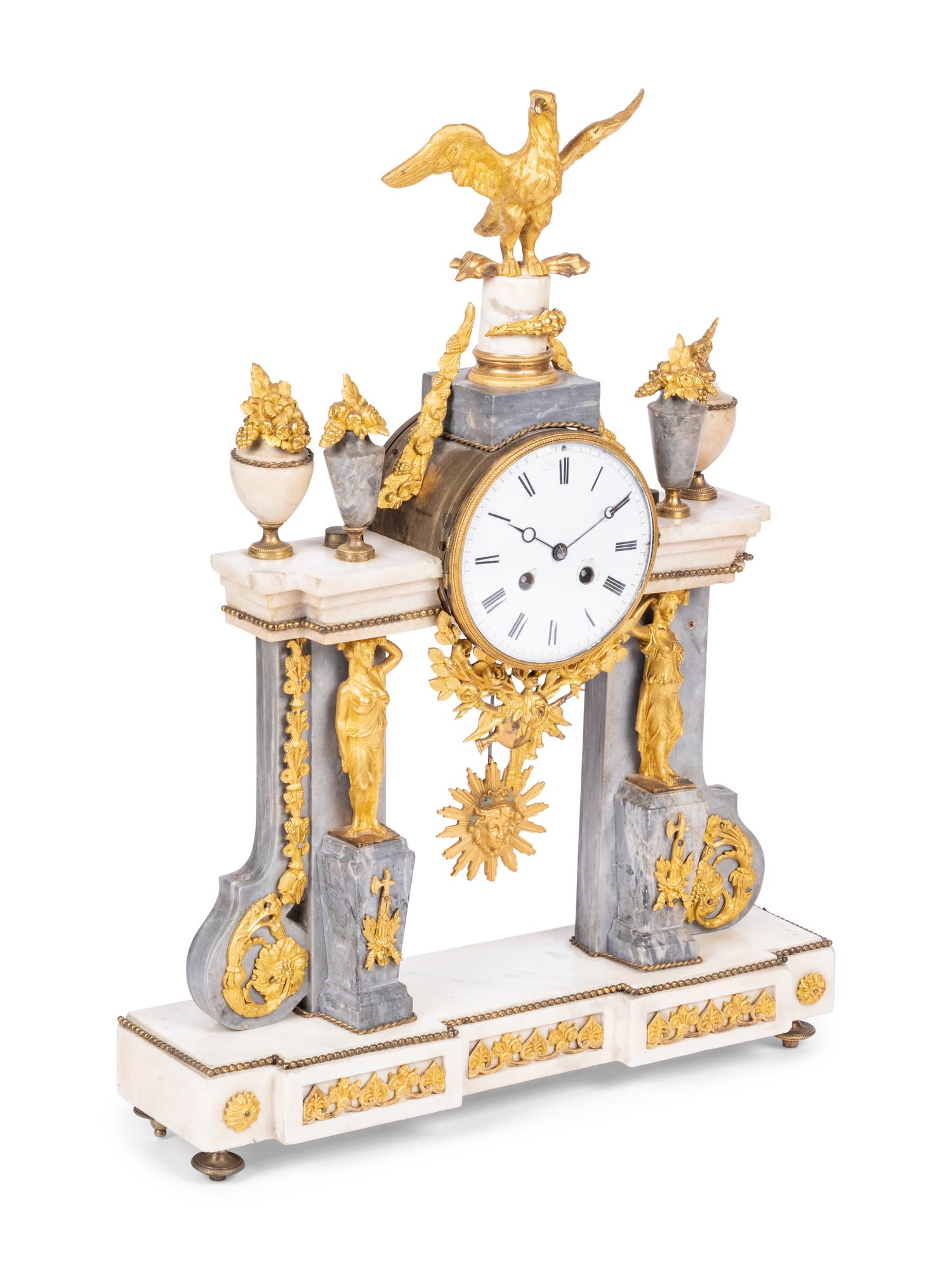 A Louis XVI Style Gilt-Bronze and Marble Mantel Clock
